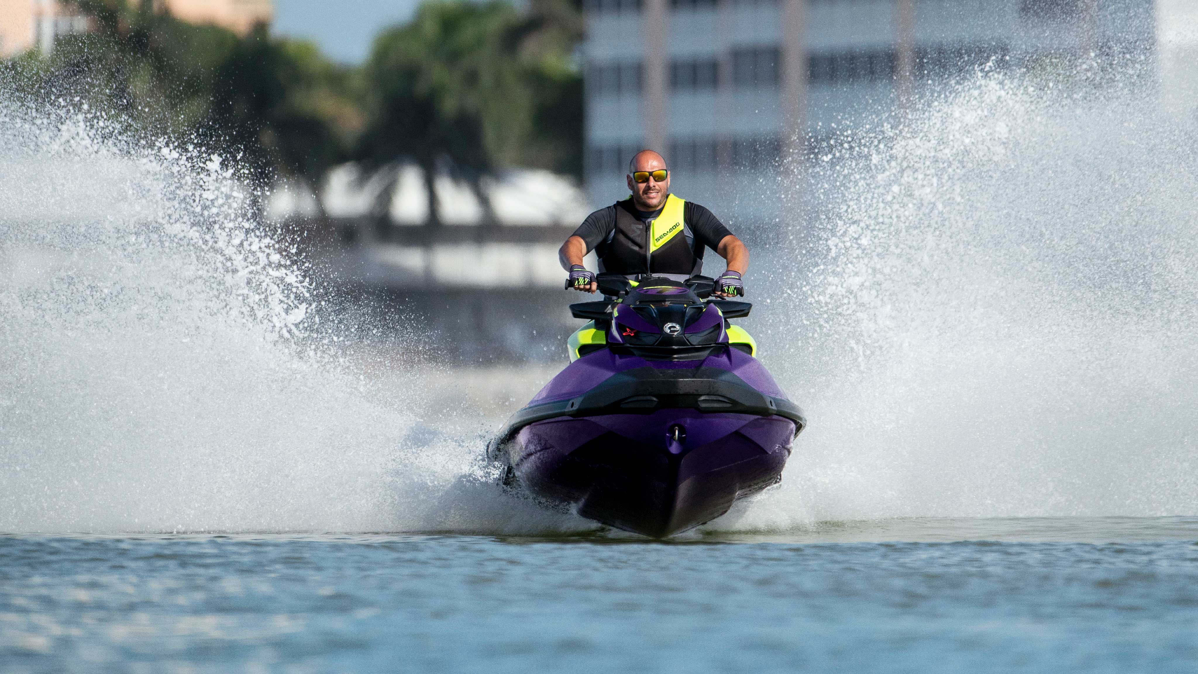 Men driving a Sea-Doo RXP-X