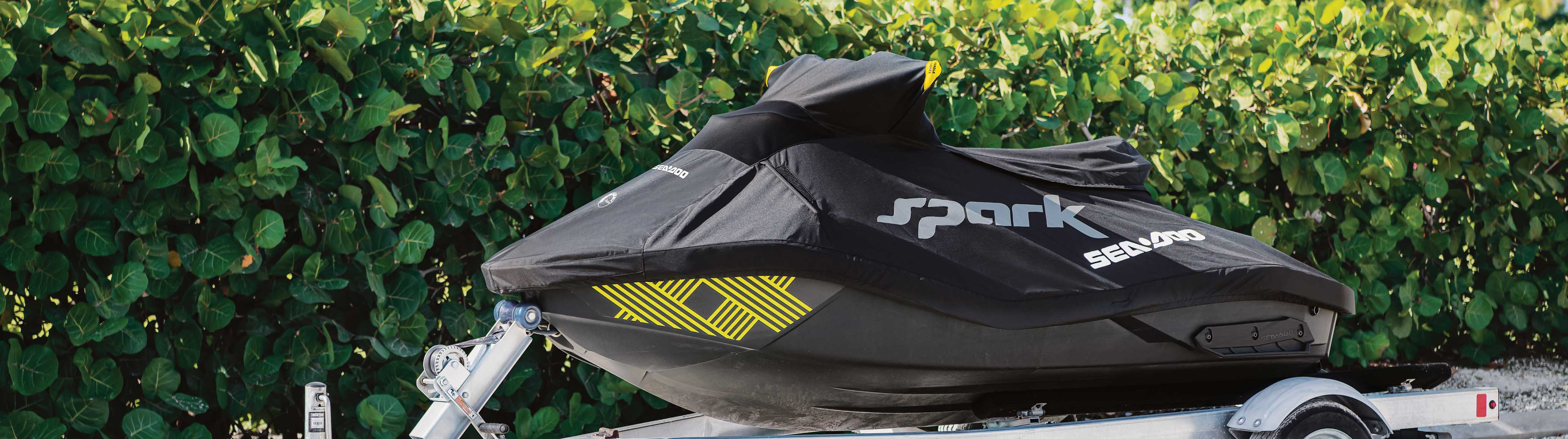 Sea-Doo SPARK with a Sea-Doo cover on a trailer