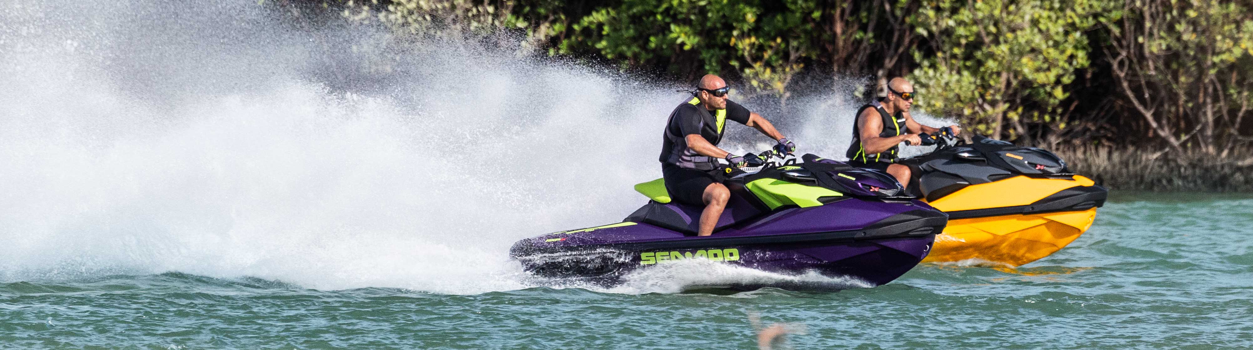 2 mens racing with their Sea-Doo RXP-X