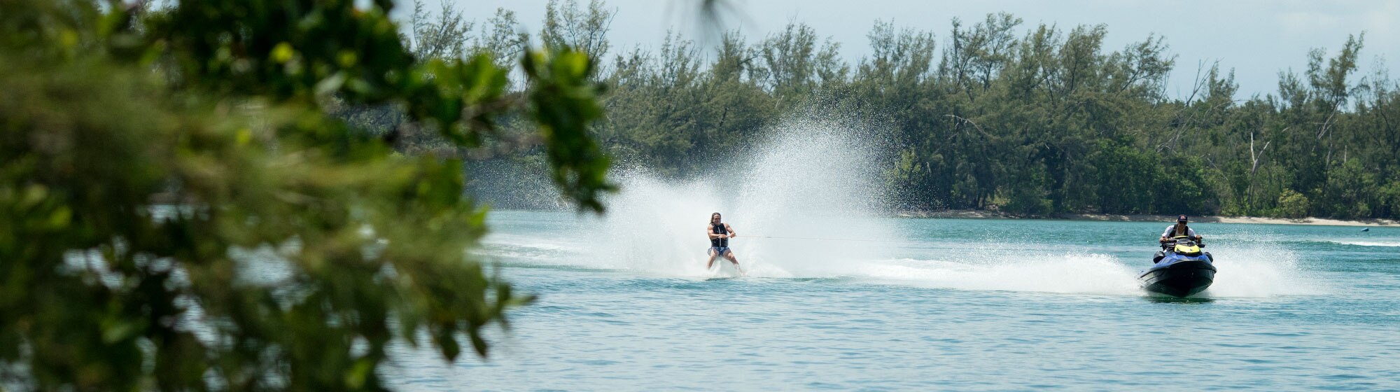 Woman doing Wakeskate towed by a Sea-doo WAKE PRO