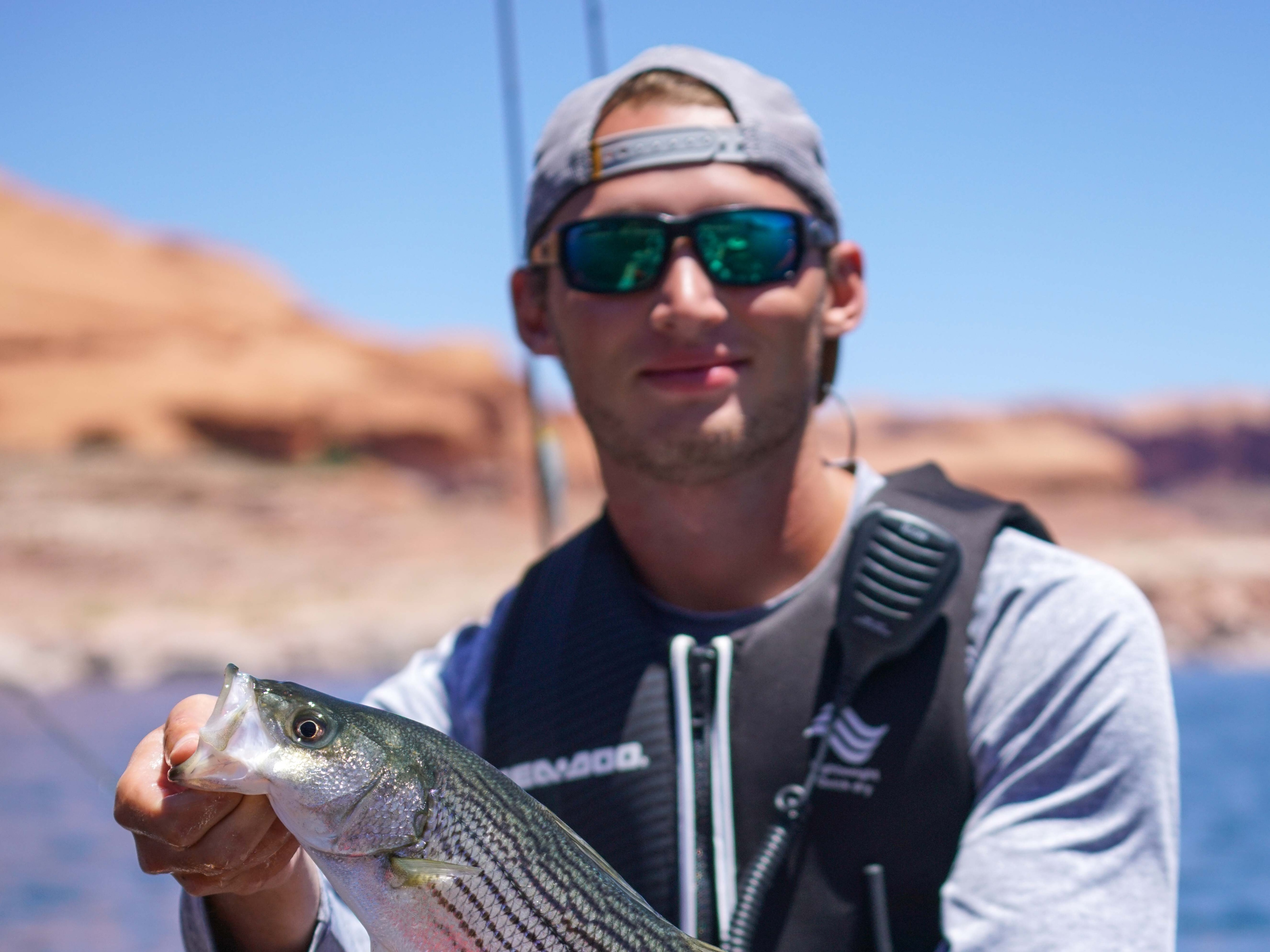 Kyle Naegeli posing with a fish