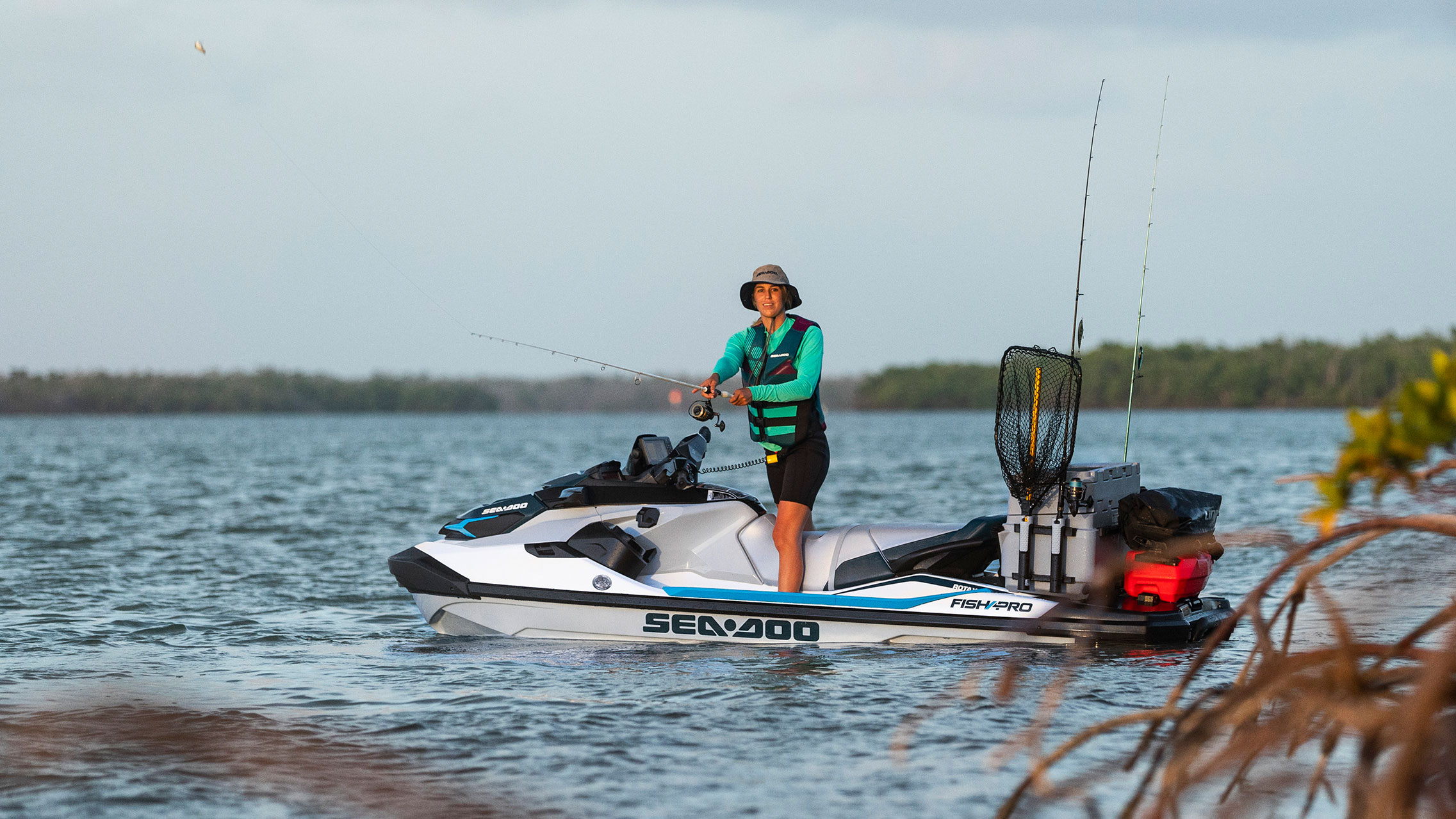 Women fishing on her Sea-Doo FISH PRO