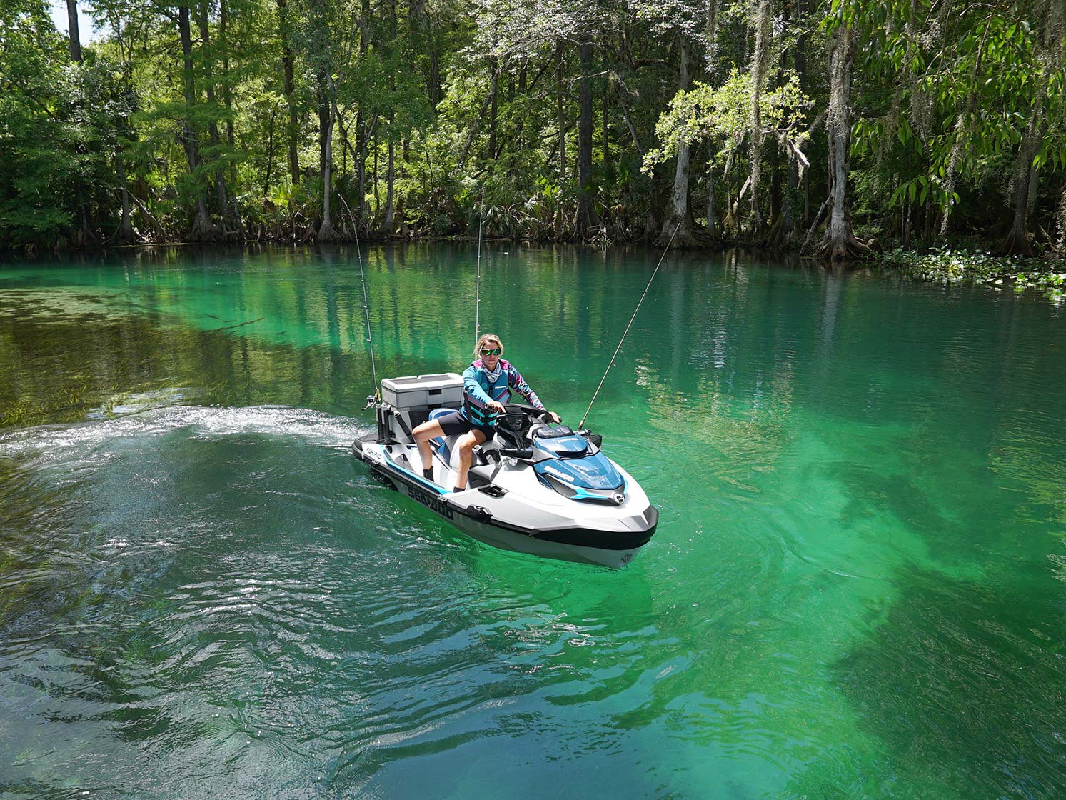 Woman riding a Sea-Doo Fish Pro with IDF