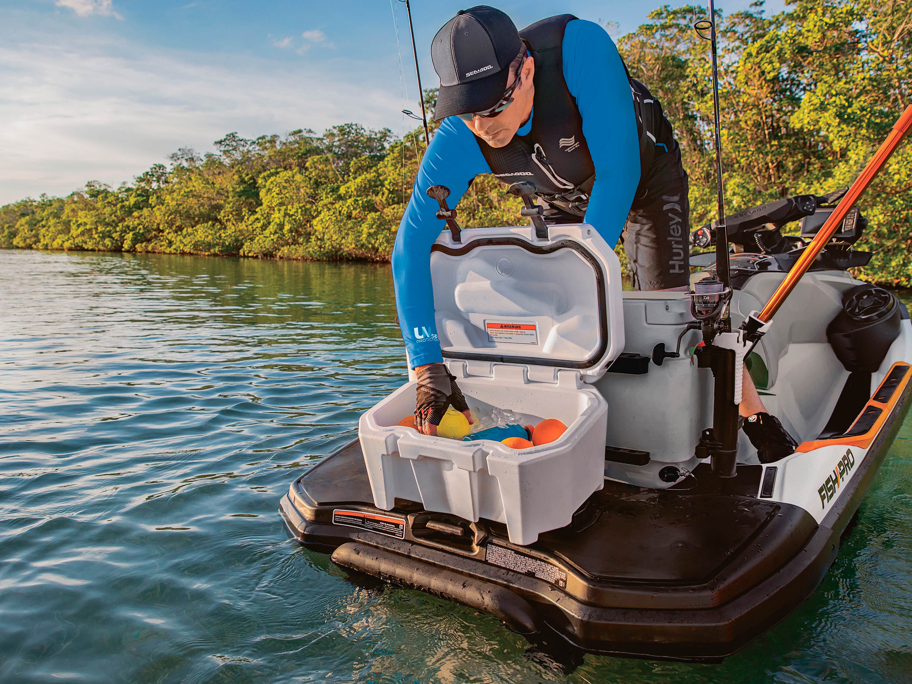 Man using a Ling Fishing Cooler on his Sea-Doo Fish Pro