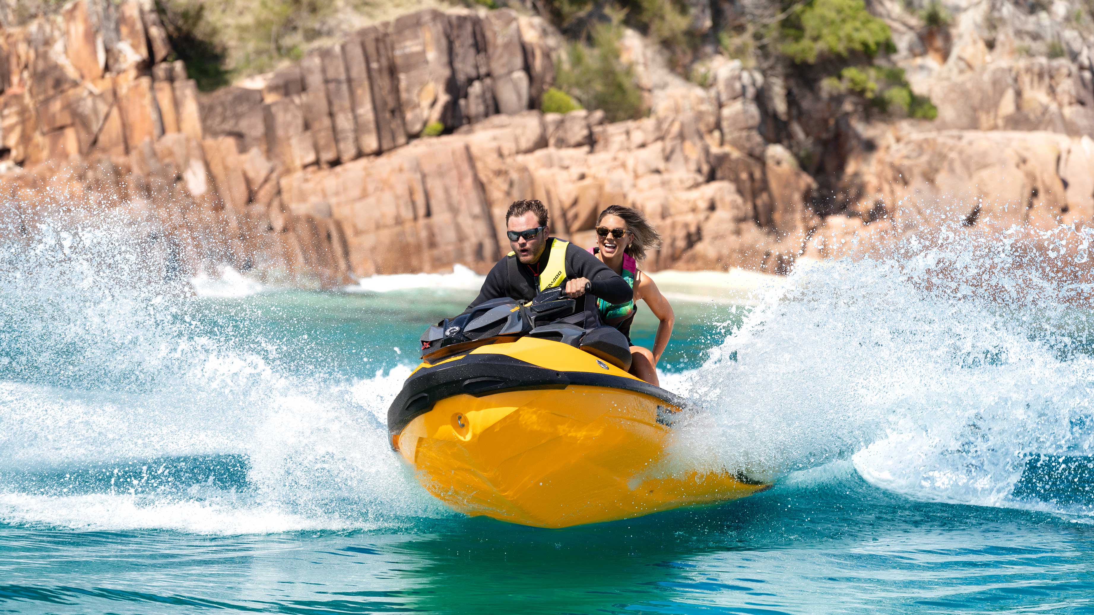 Coupe riding a Sea-Doo RXP-X