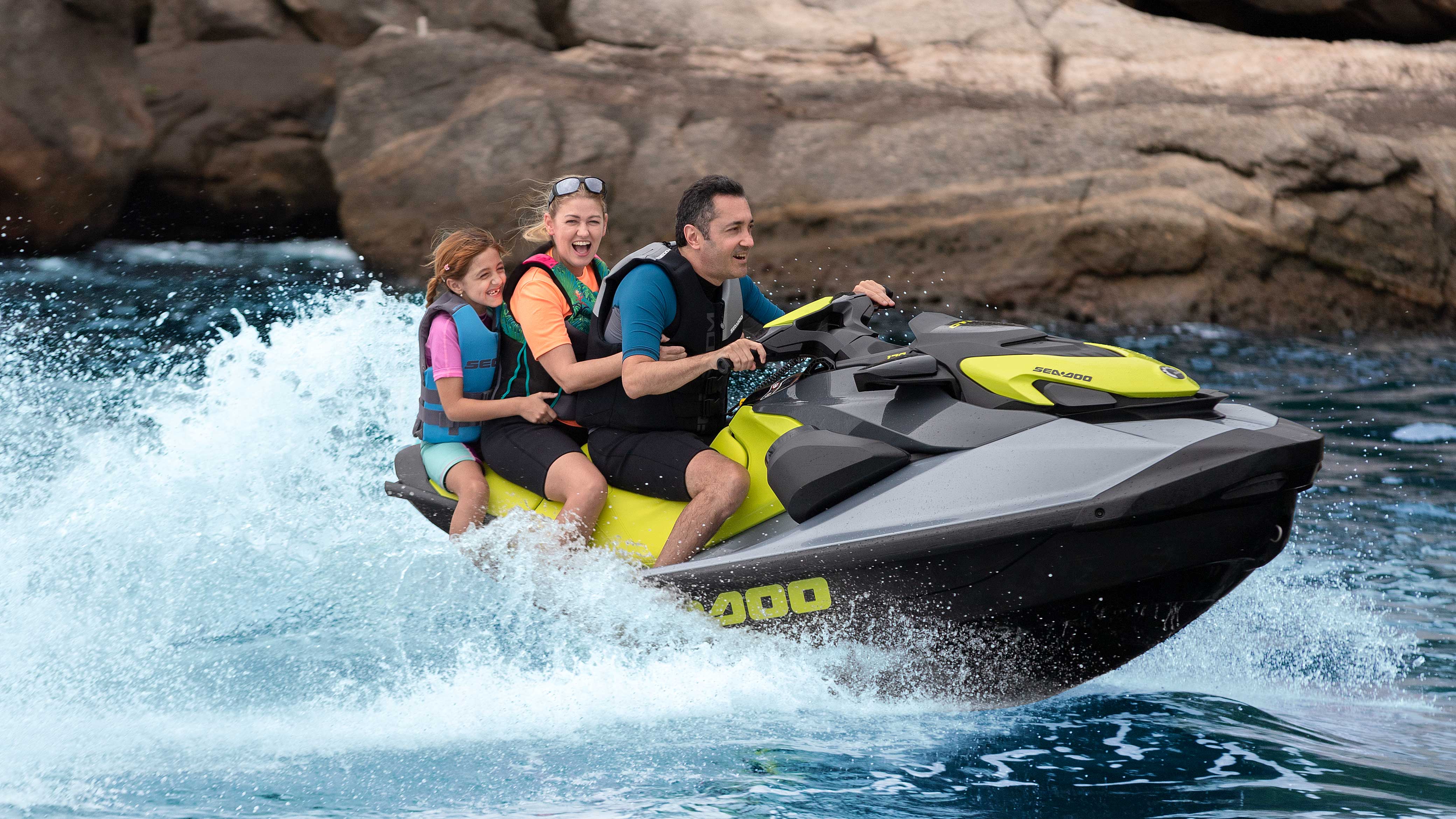 Family riding on a Sea-Doo GTI SE