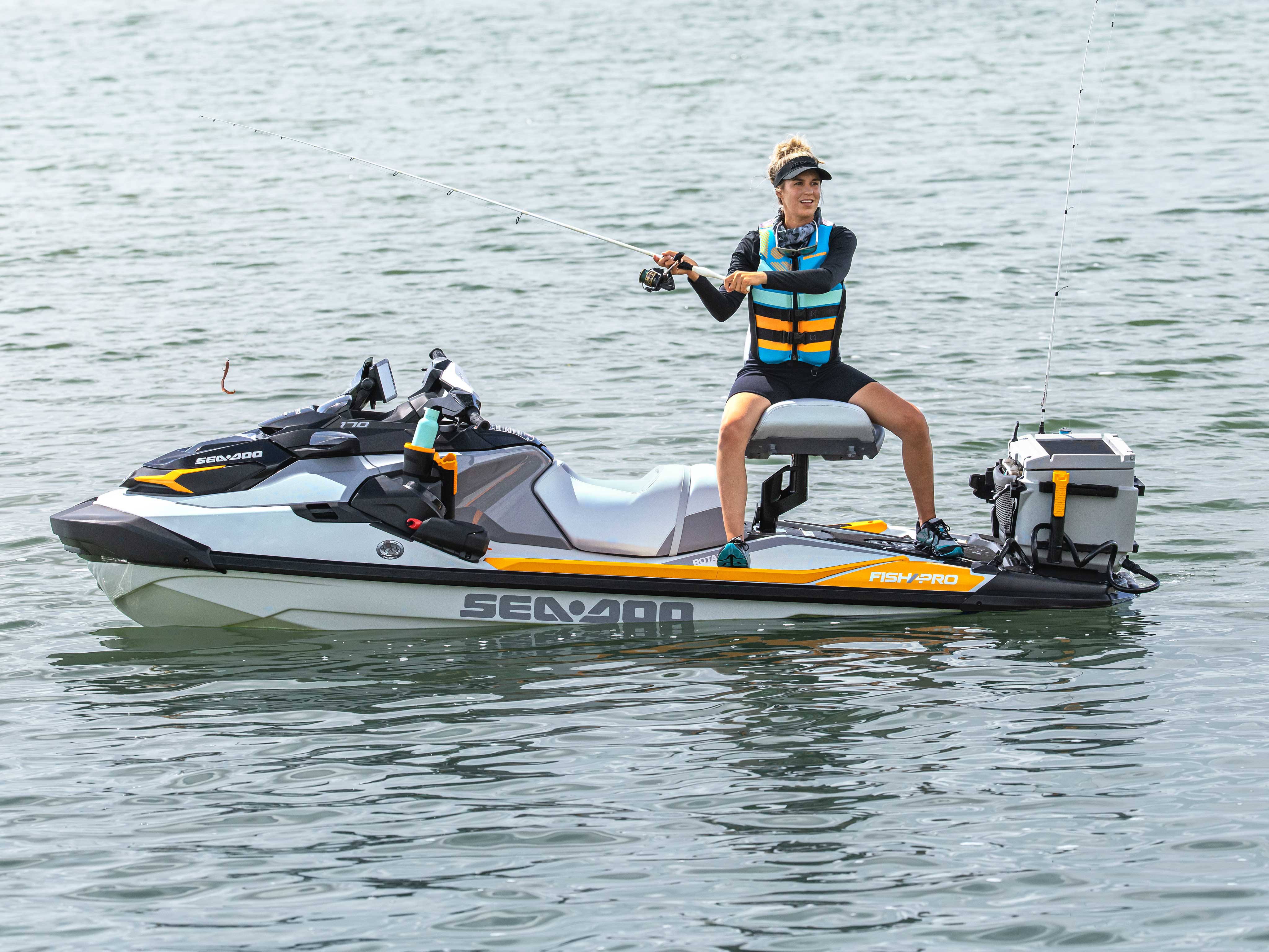 Woman fishing on her Sea-Doo FishPro Trophy with the new modular swivel seat