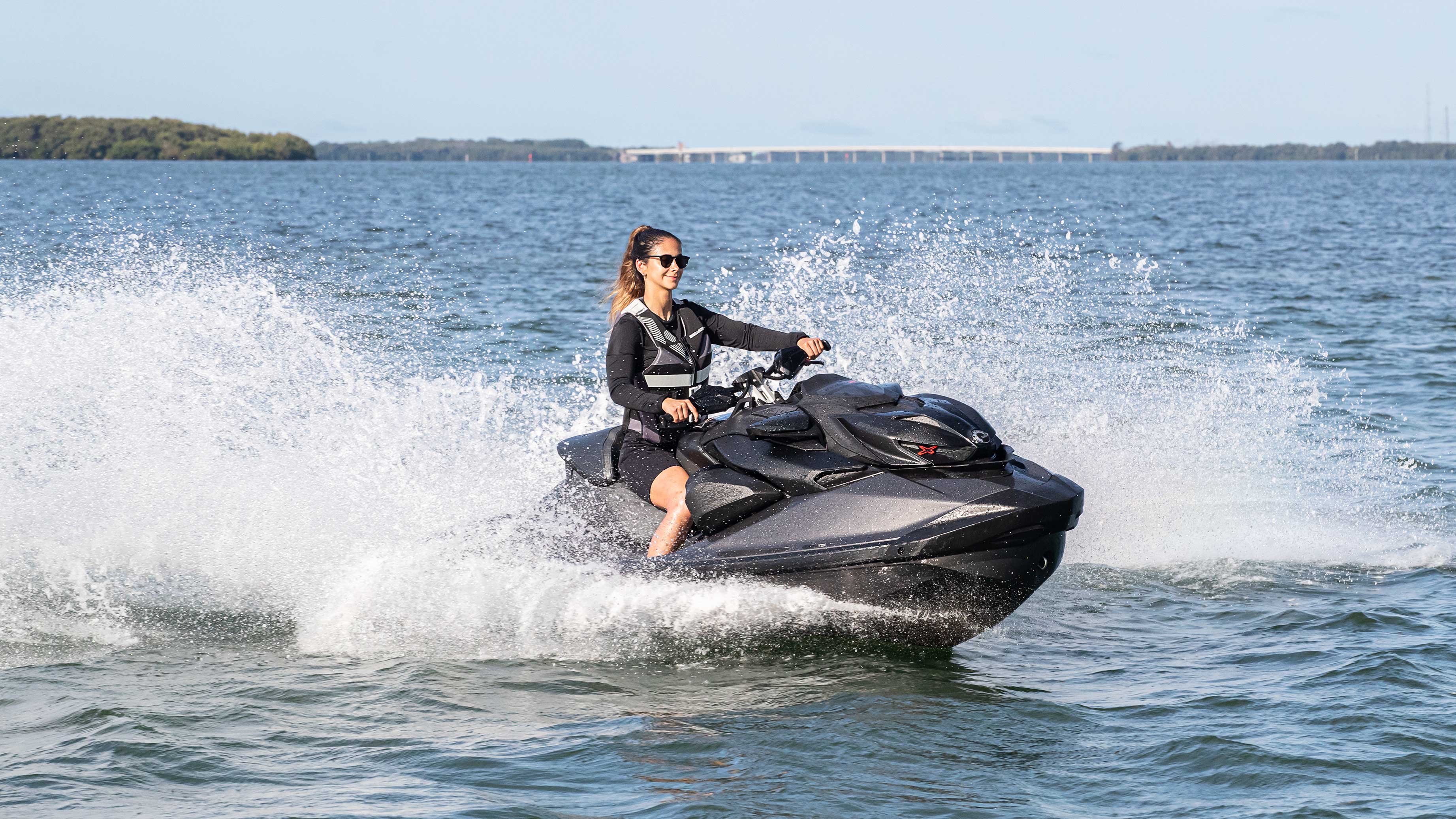 a woman riding Sea-Doo 2022 waterctaft