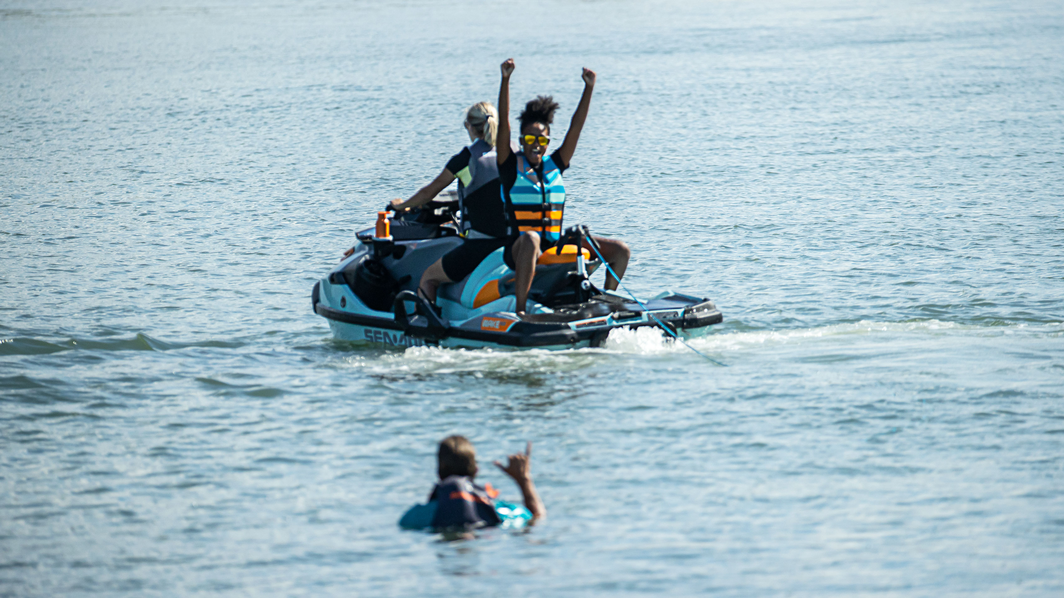 Friends enjoying a Sea-Doo Wake Pro