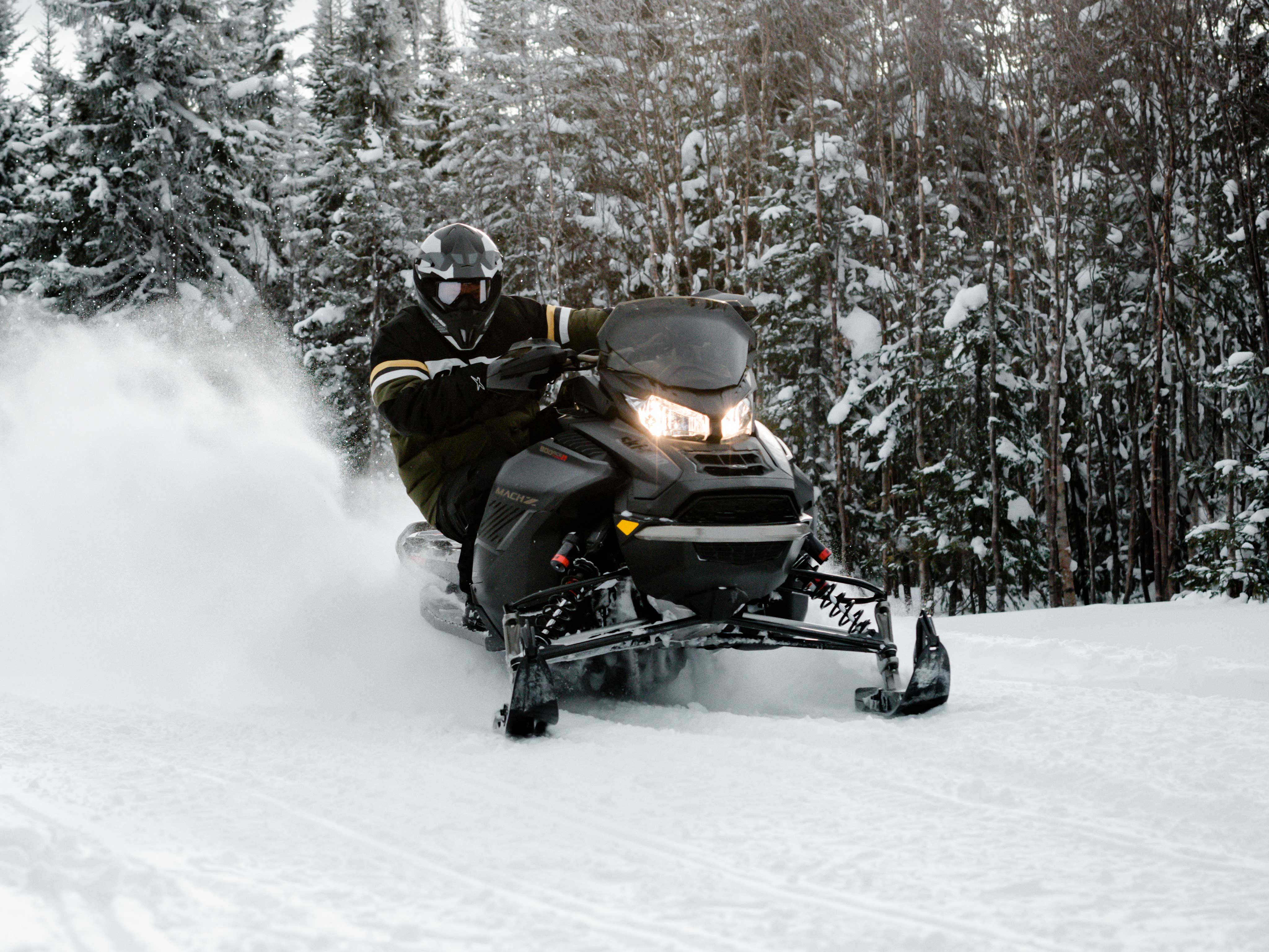 Pilot carving with his 2022 Ski-Doo Mach-Z