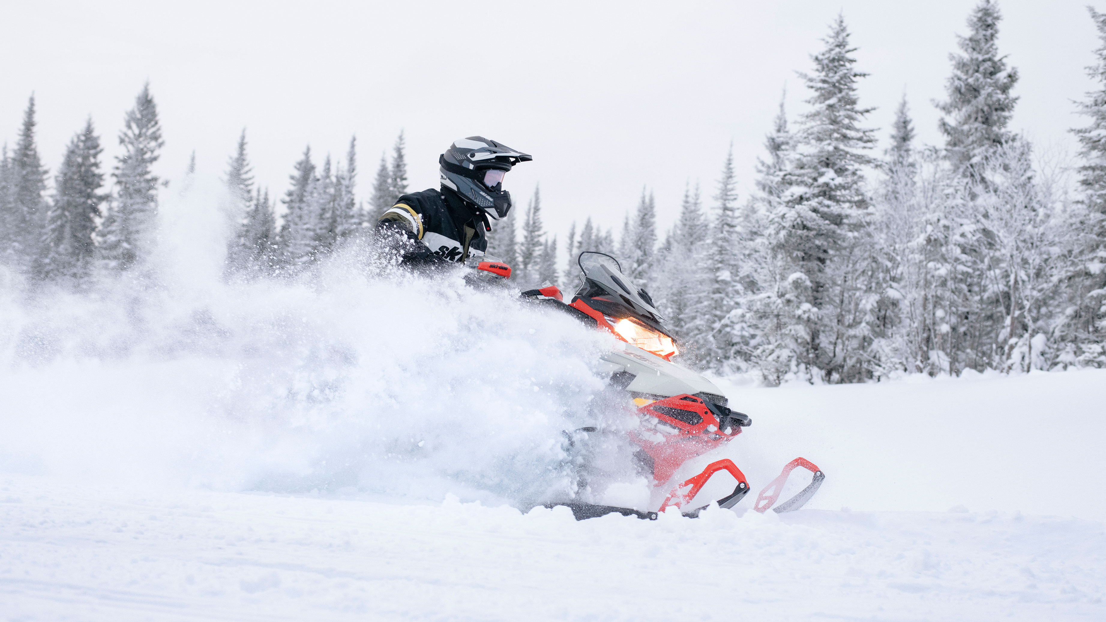 Man riding the new Ski-Doo MXZ on a trail