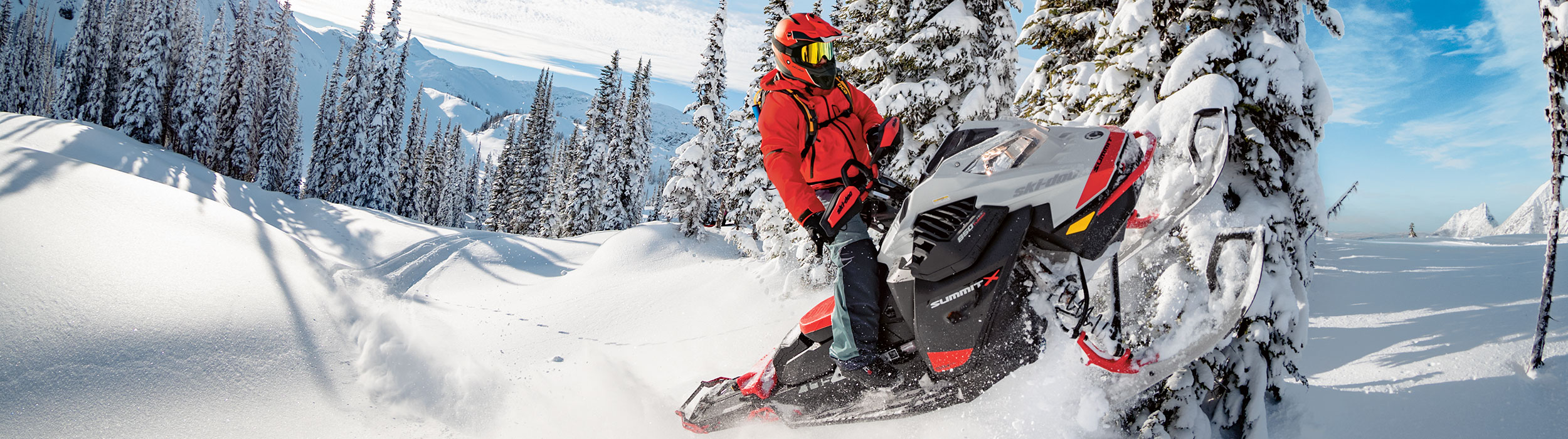 Rider jumping with a Ski-Doo Summit