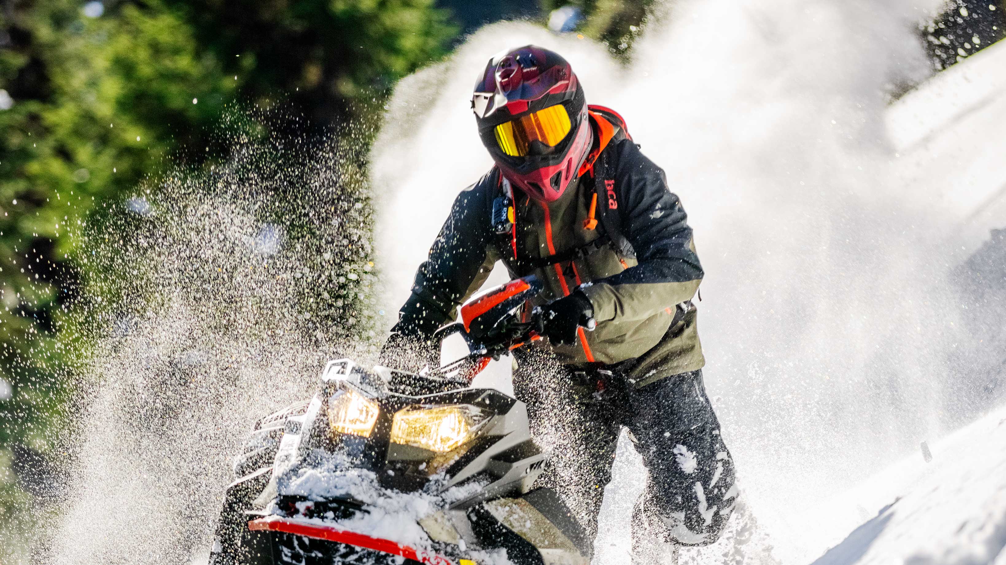 Man riding Powder with his 2022 Ski-Doo Summit