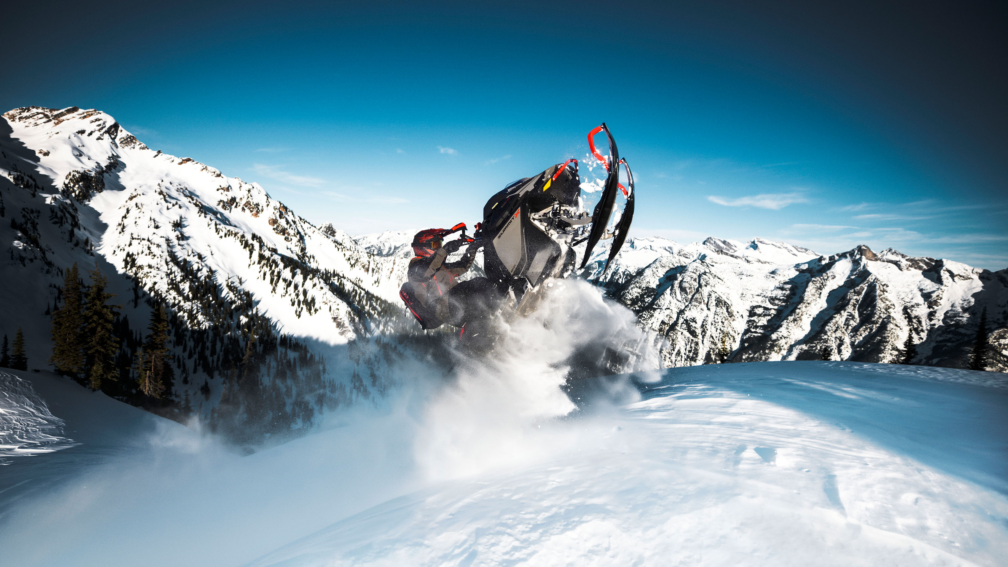 Ski-Doo Summit jumping in Deep-Snow