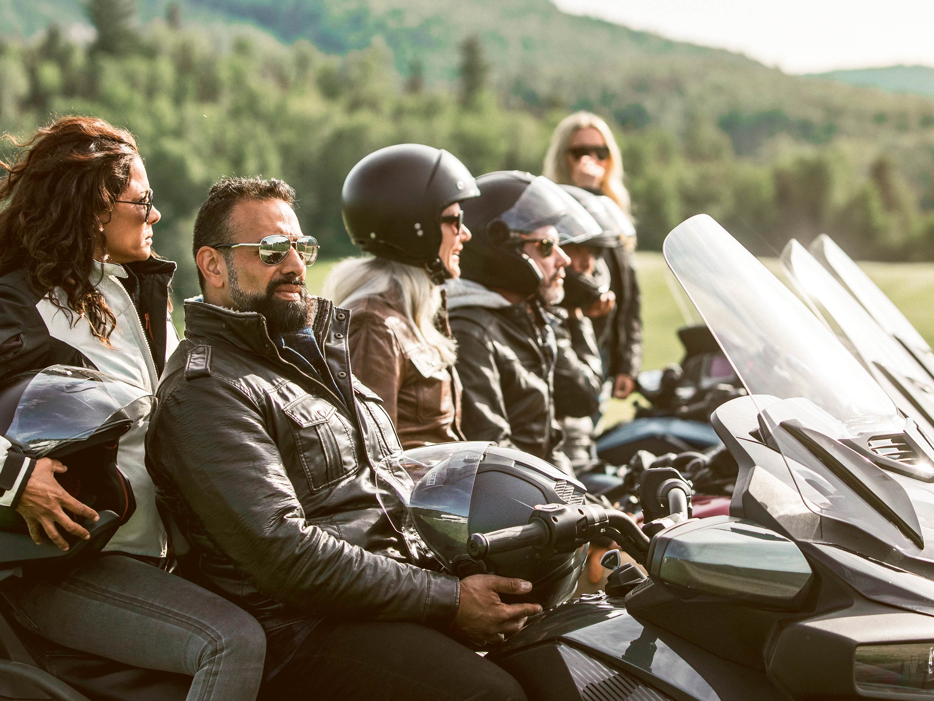 Woman and man riding a Can-Am Spyder RT 2021