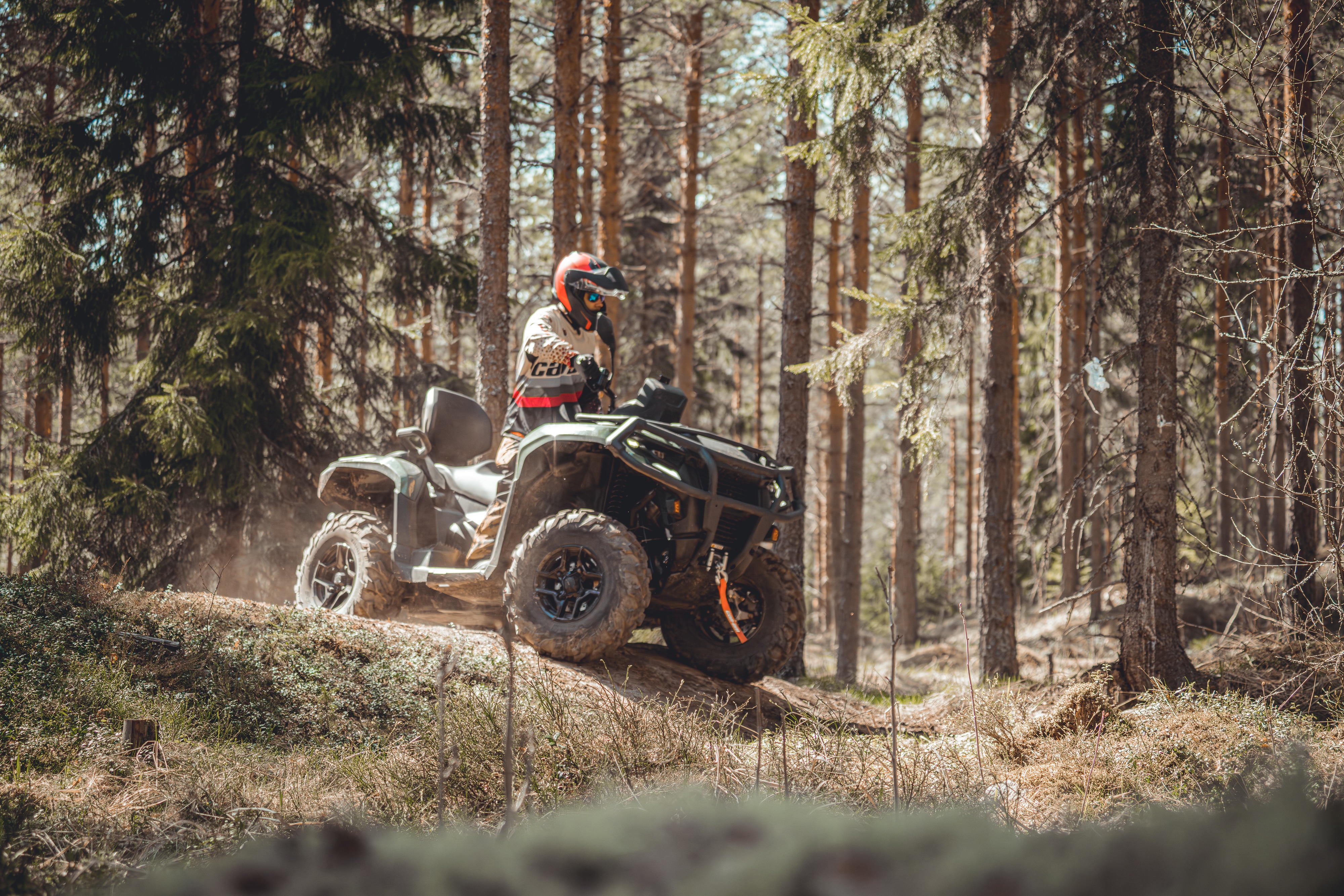 Can-Am outlander Pro in action in a forest