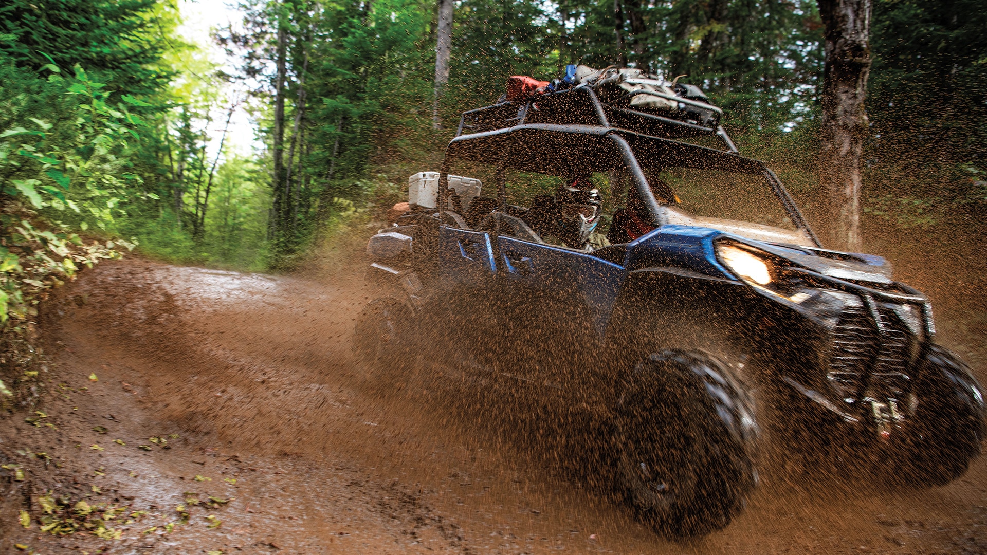 Can-Am Commander riding in the mud