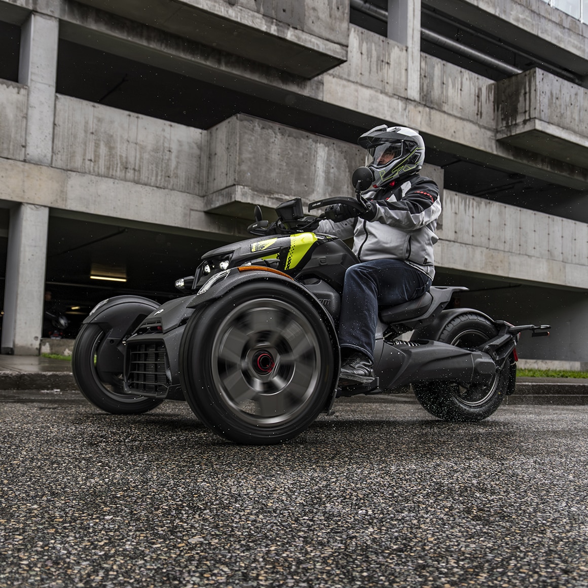 Motorcyclist riding a 2027 Can-Am Ryker in the city