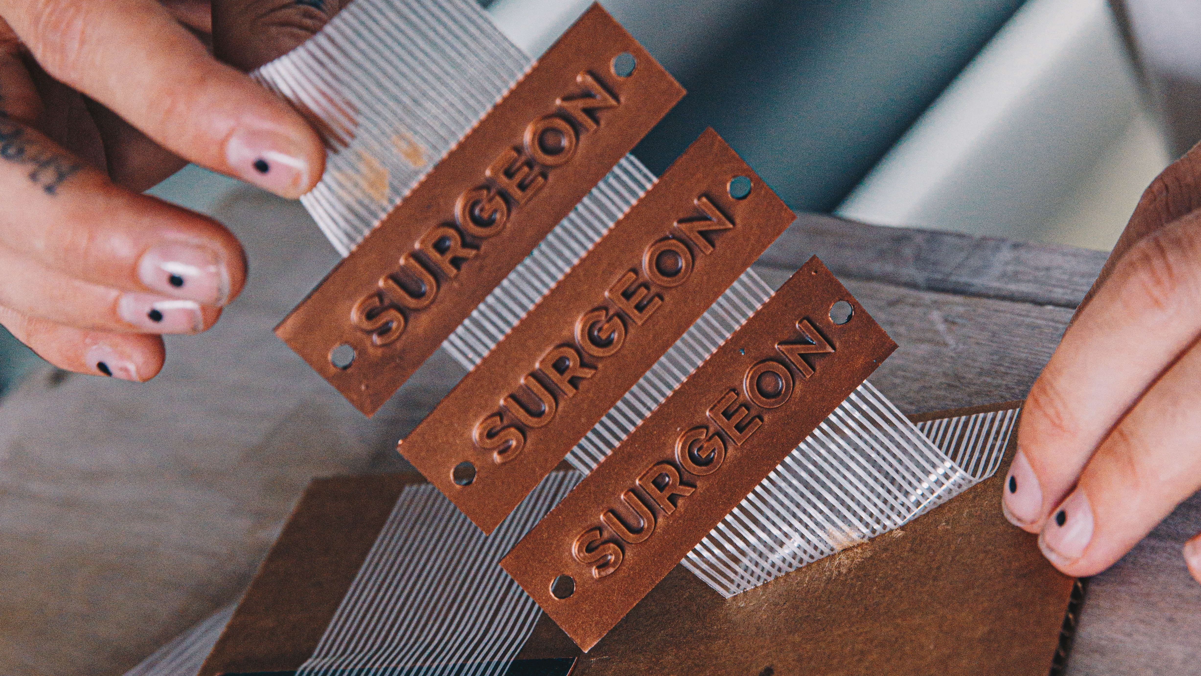 The Shoe Surgeon's custom brand plates