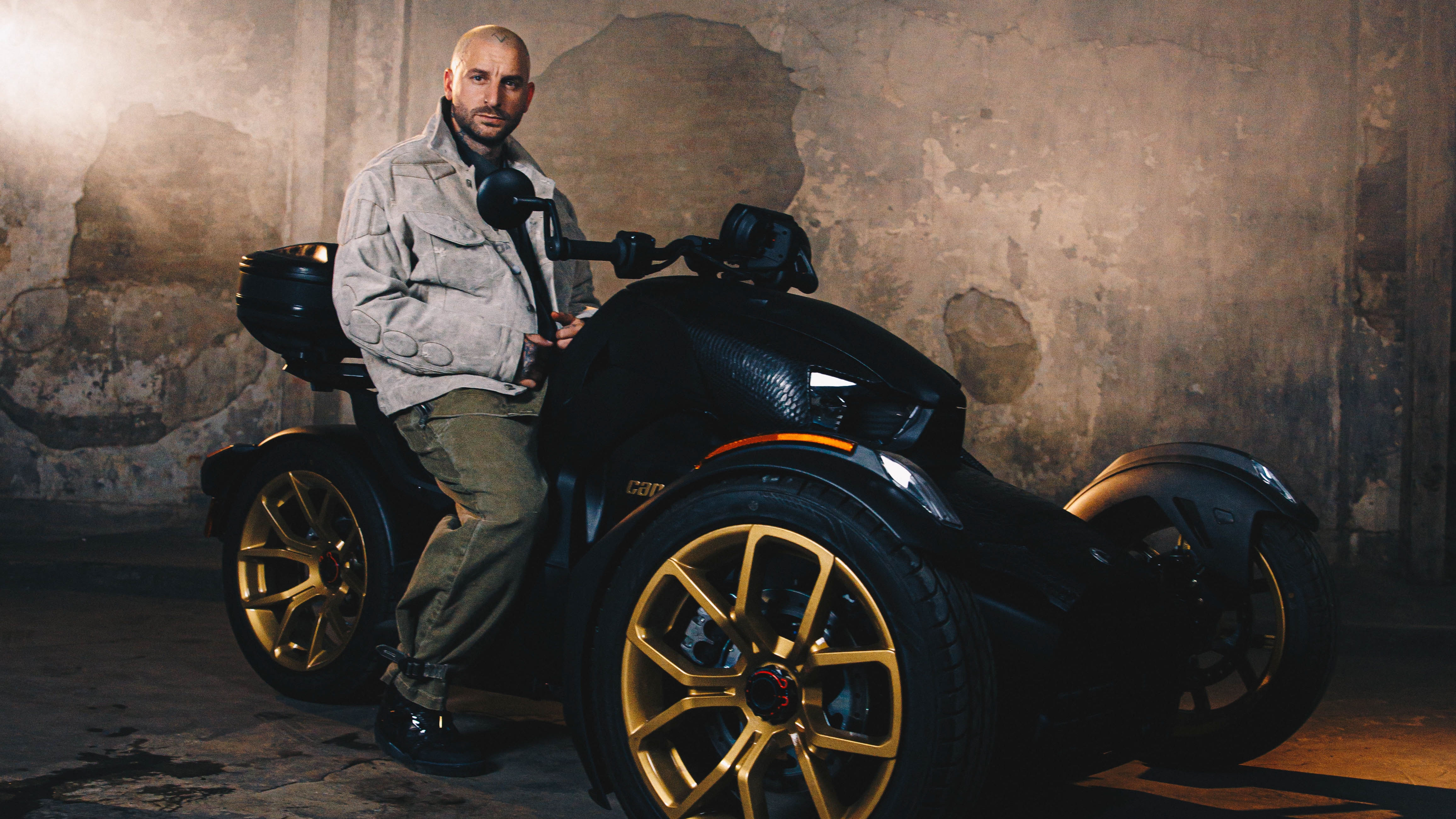 Rider wearing The Shoe Surgeon's Heritage shoes sitting on a 2023 Can-Am Ryker 3-wheel vehicle