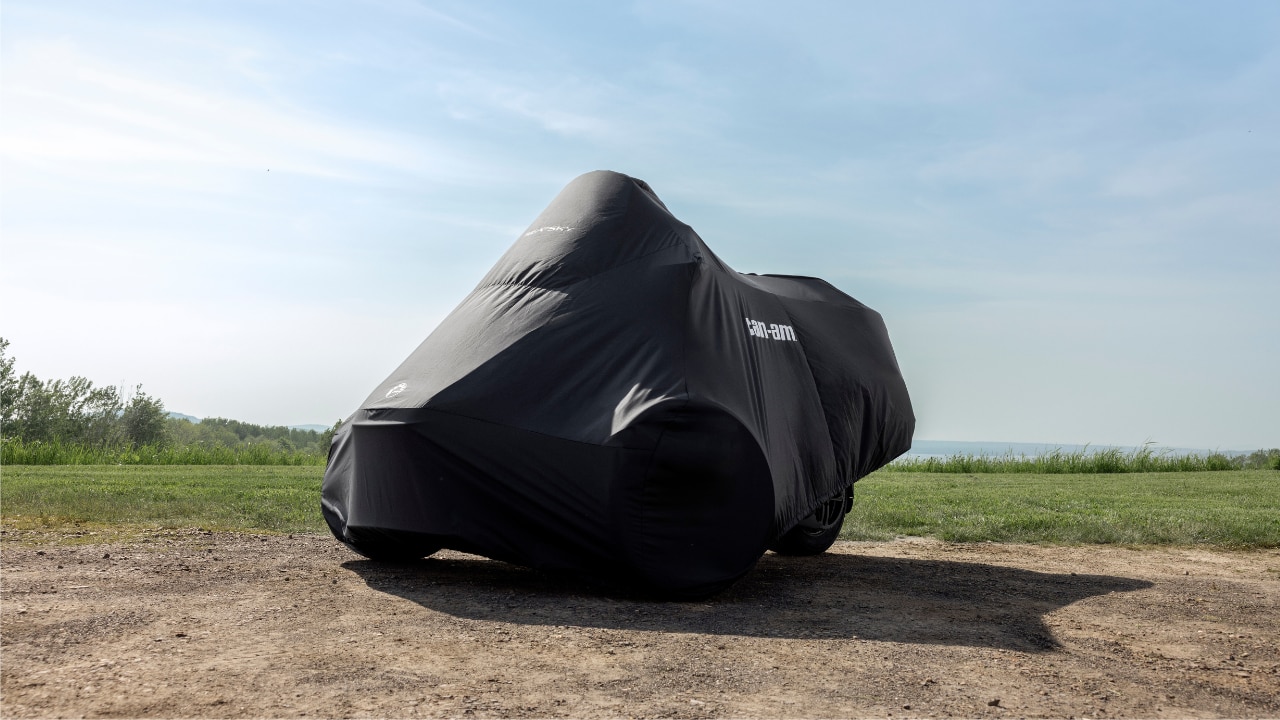 A 2026 Can-Am Spyder RT Sea-to-Sky protected by an exclusive vehicle cover