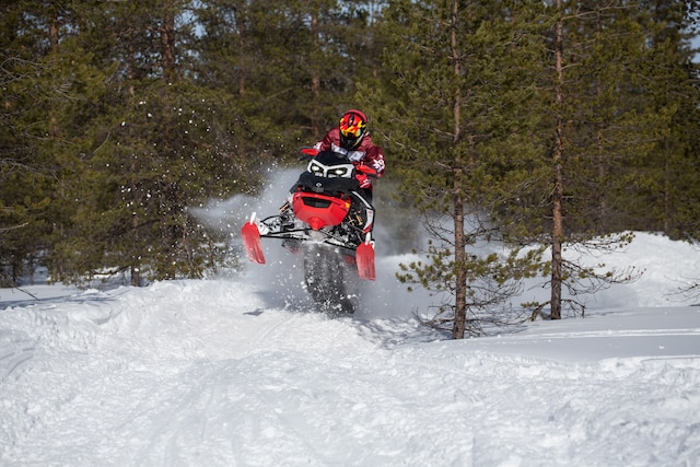 Rave Enduro snowmobile jumping