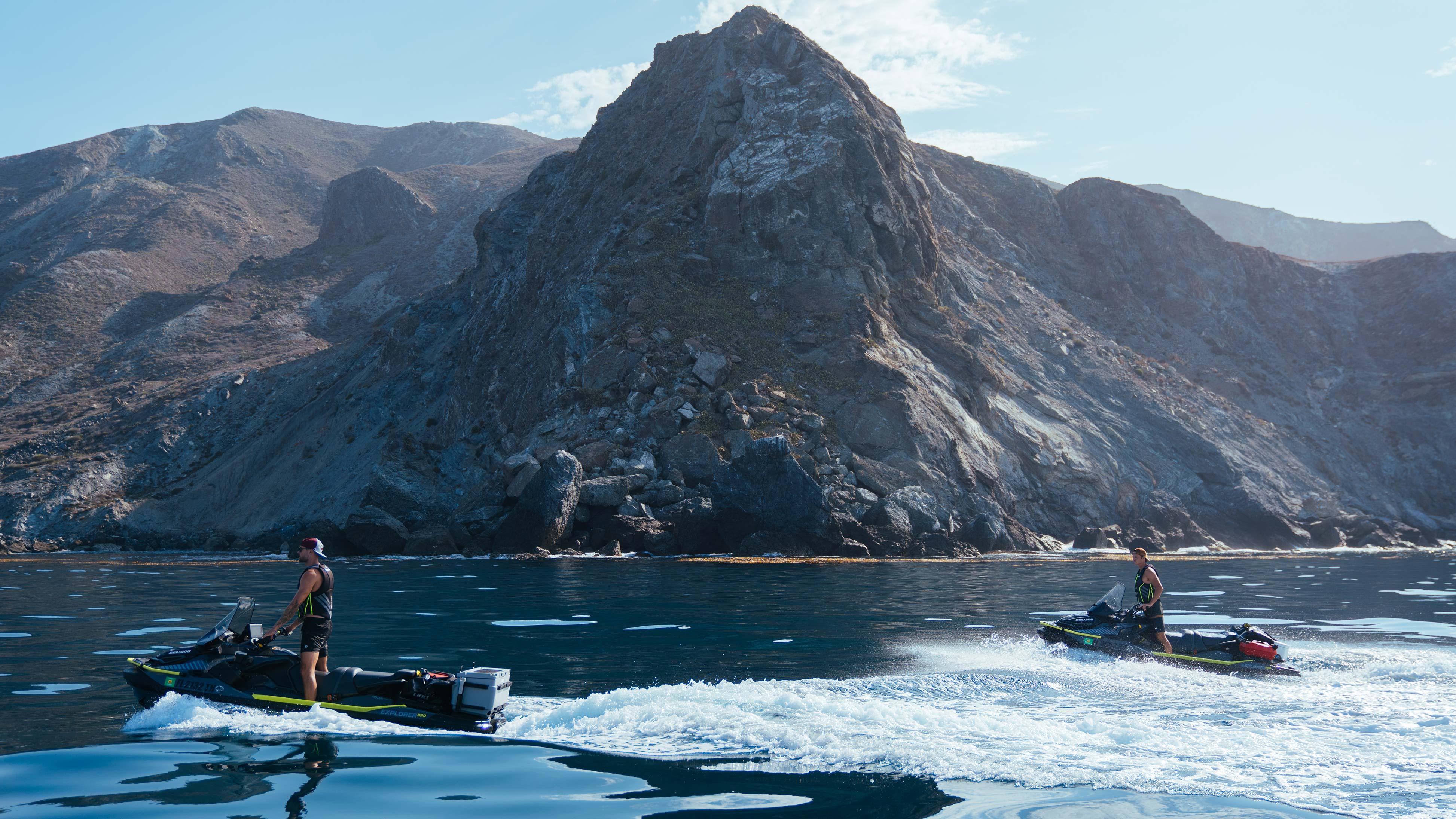 Two friends riding their Sea-Doo Explorer Pro near Catalina Island