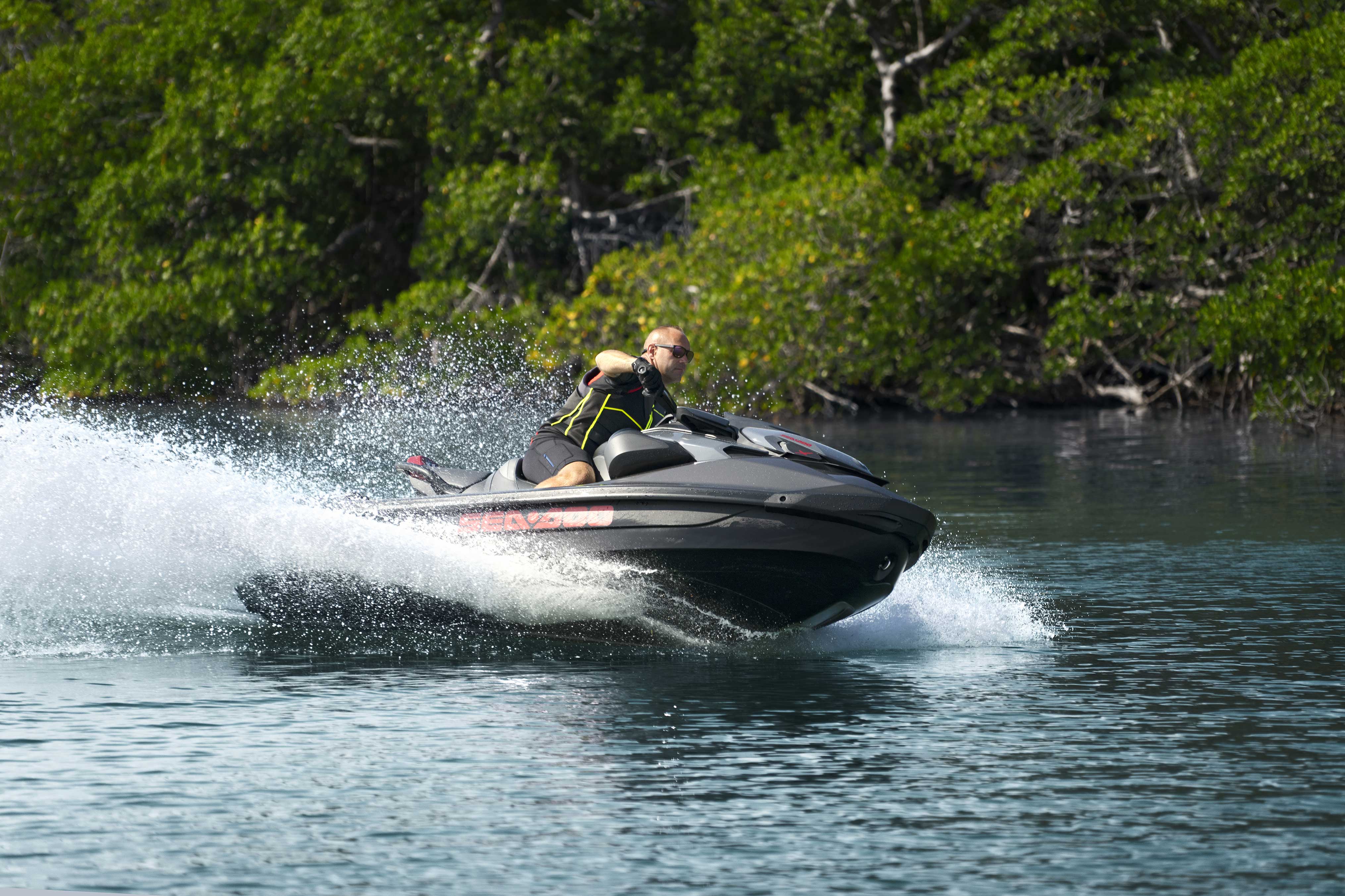 Man riding the Sea-Doo GTR-X 300 personal watercraft