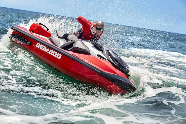 Couple riding a Sea-Doo Spark Trixx personal watercraft