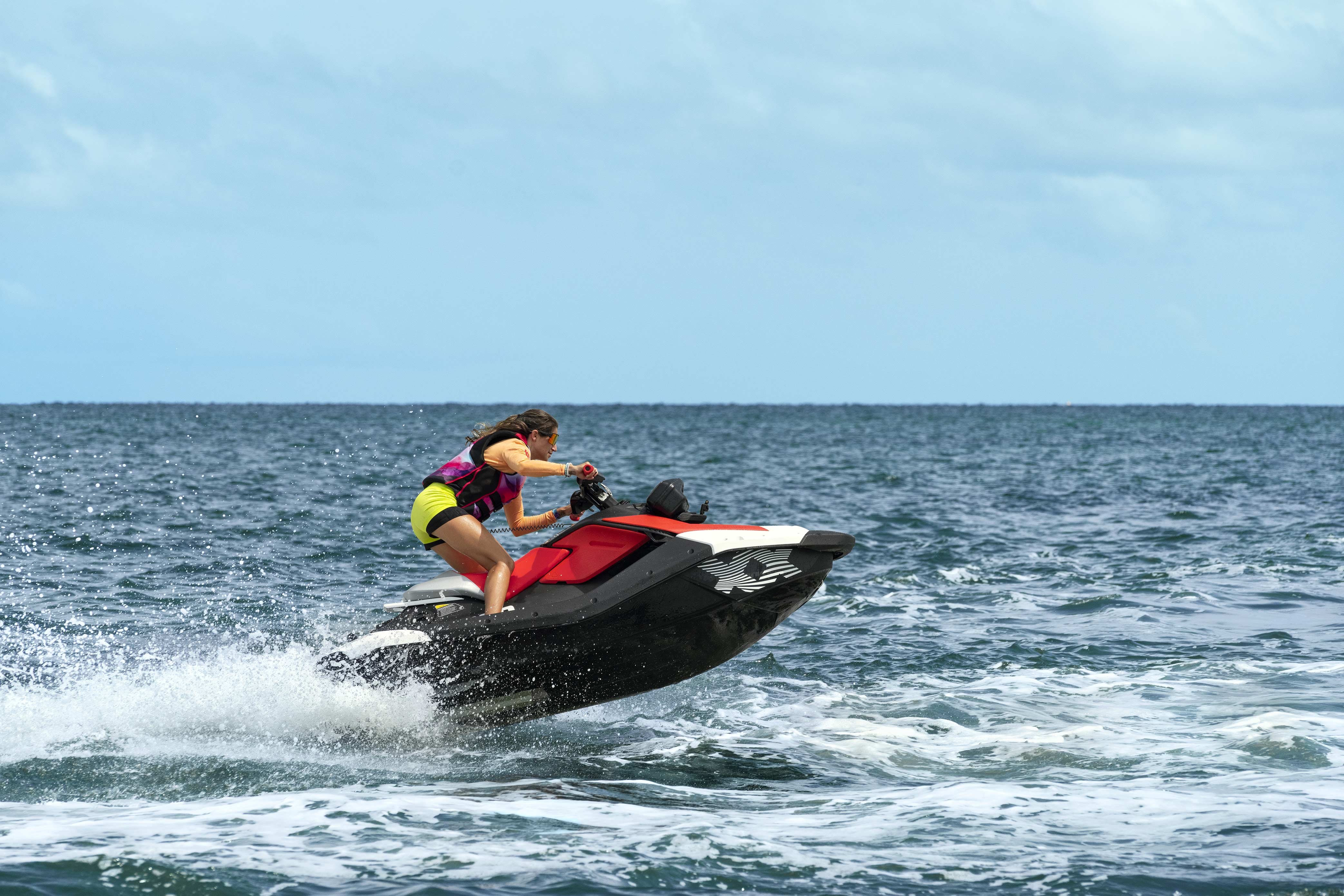 Woman going full speed on a Sea-Doo Spark Trixx