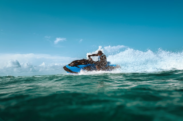 Woman riding a high performance Sea-Doo RXT-X