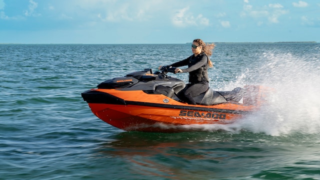 Woman riding a 2027 Sea-Doo RXT-X