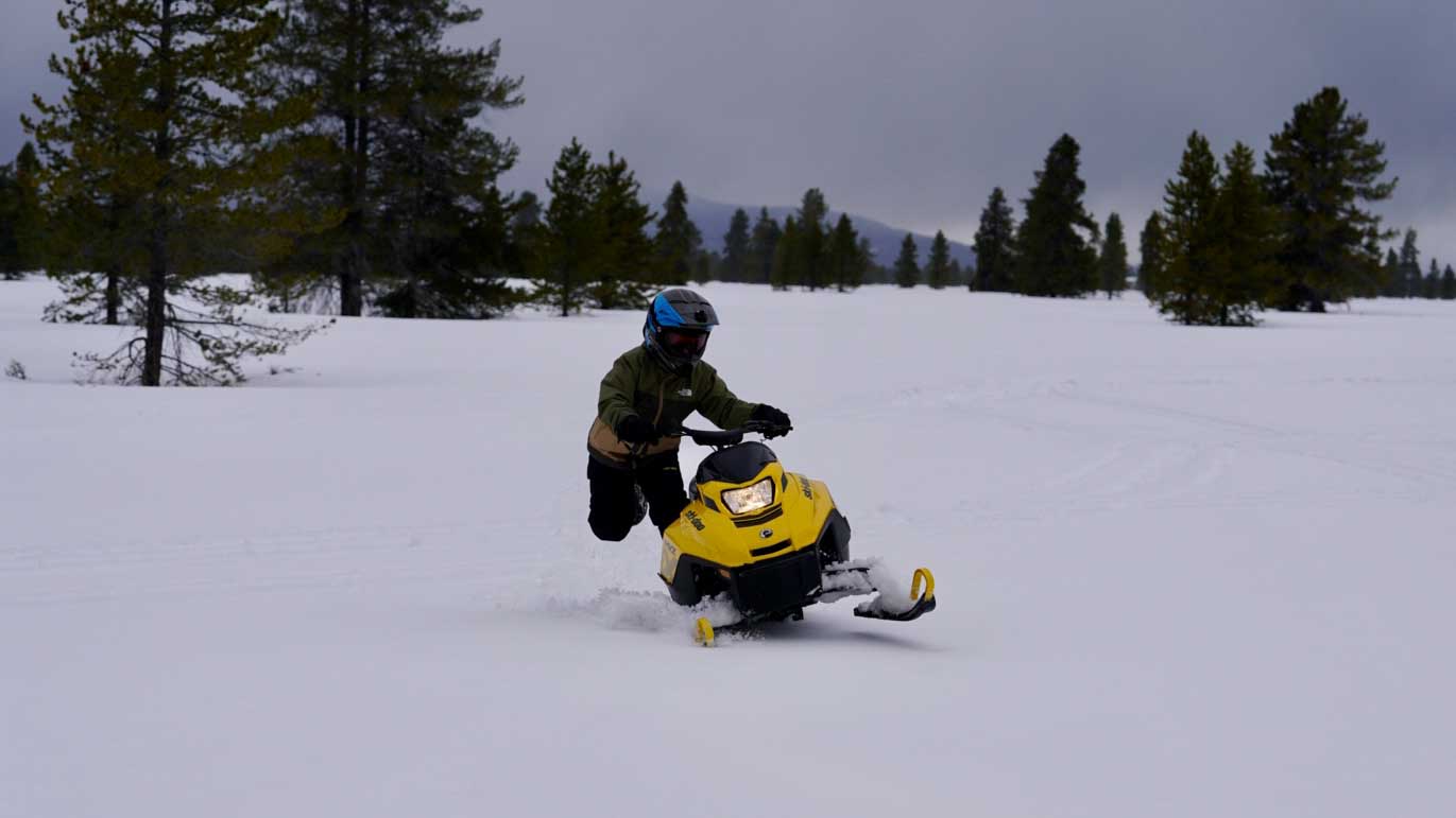 Kid riding the Ski-Doo MXZ 200