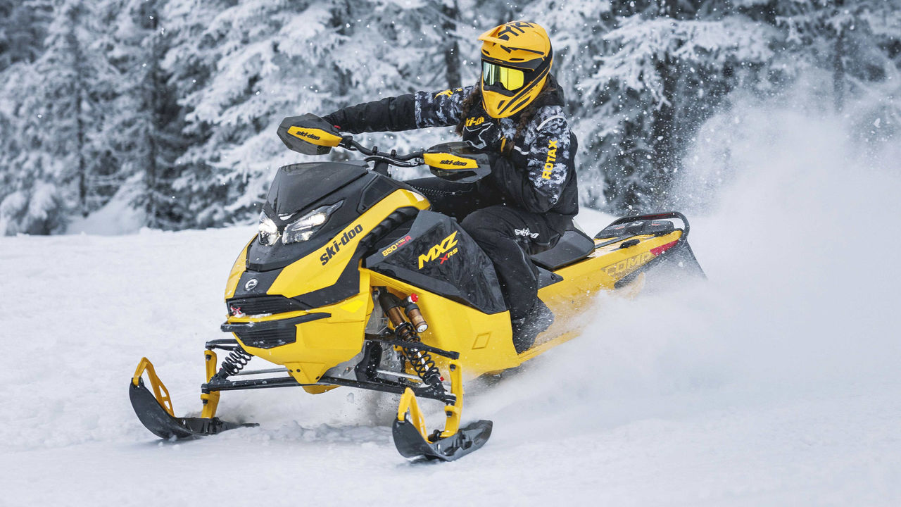 Woman going full speed with the MXZ X-RS with Competition package