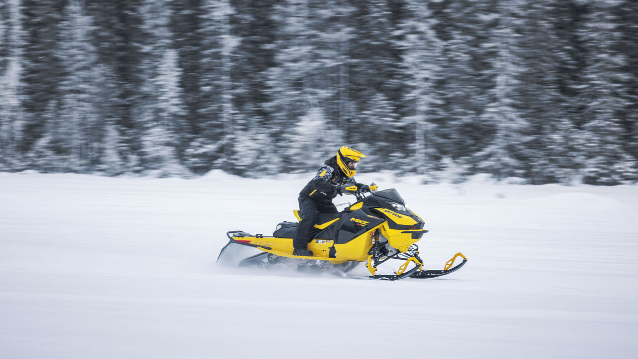 Woman riding the MXZ X-RS with Competiton package