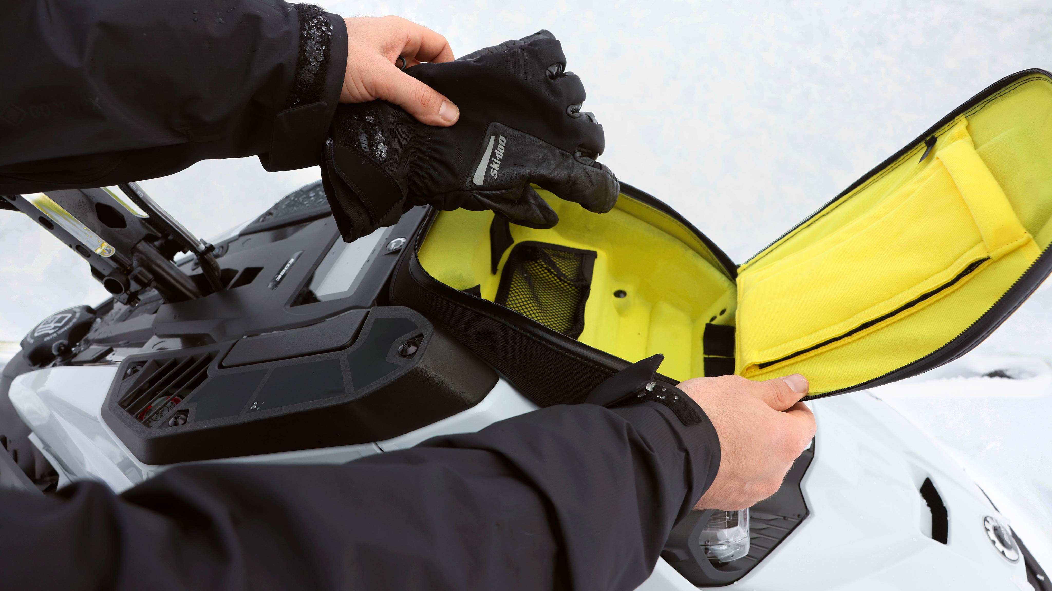 Rider using a LinQ bag on his Ski-Doo snowmobile