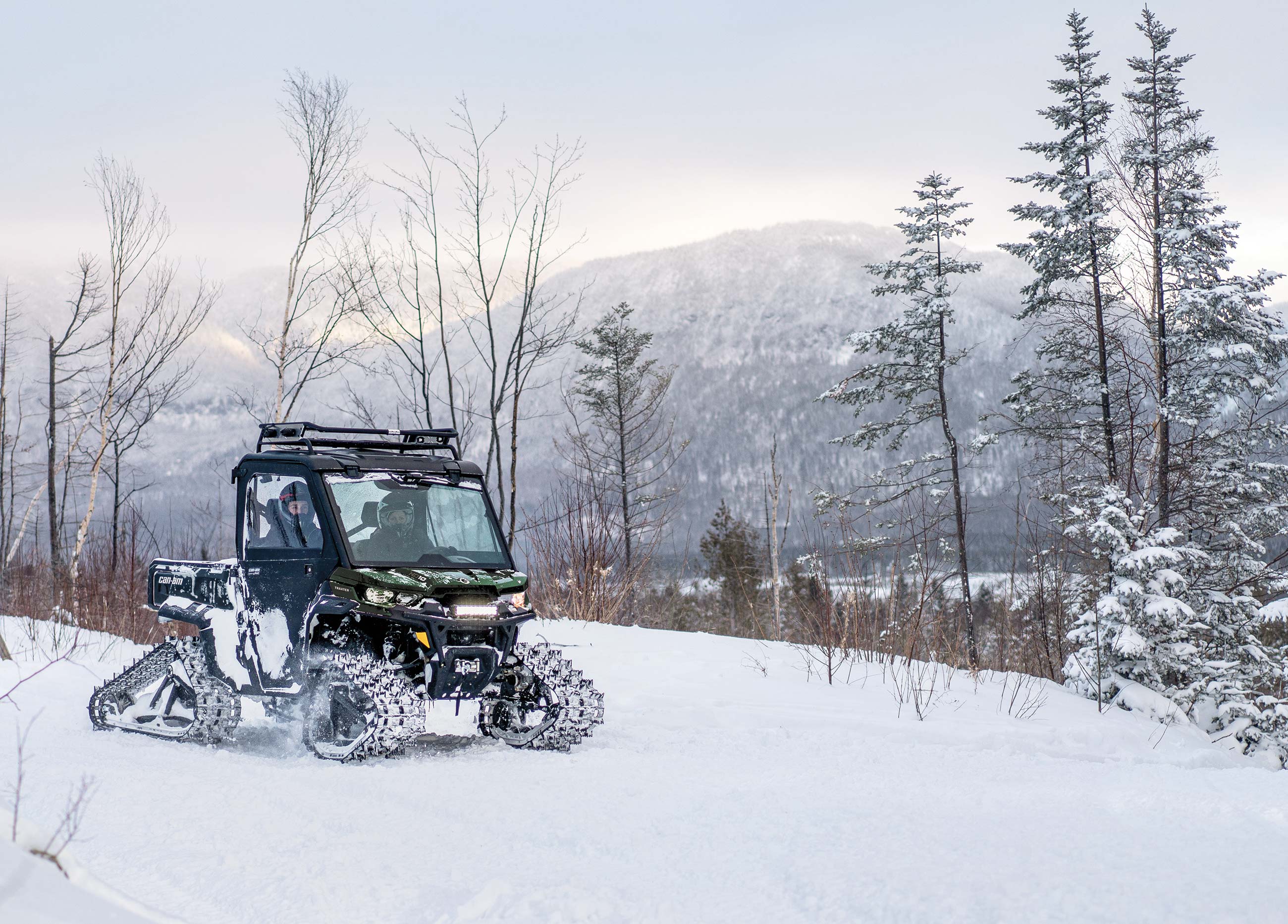 Traxter on snow with track kit