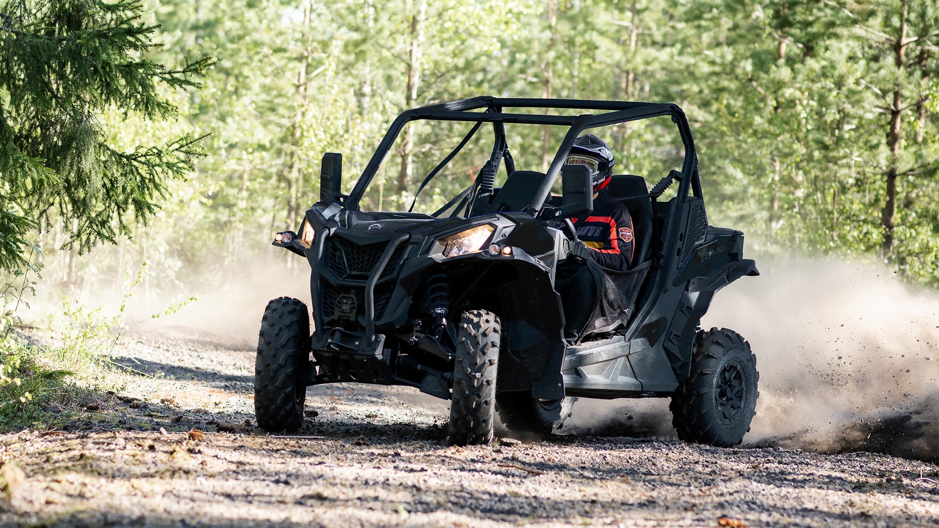 Can-Am Maverick Trail side-by-side in the mud