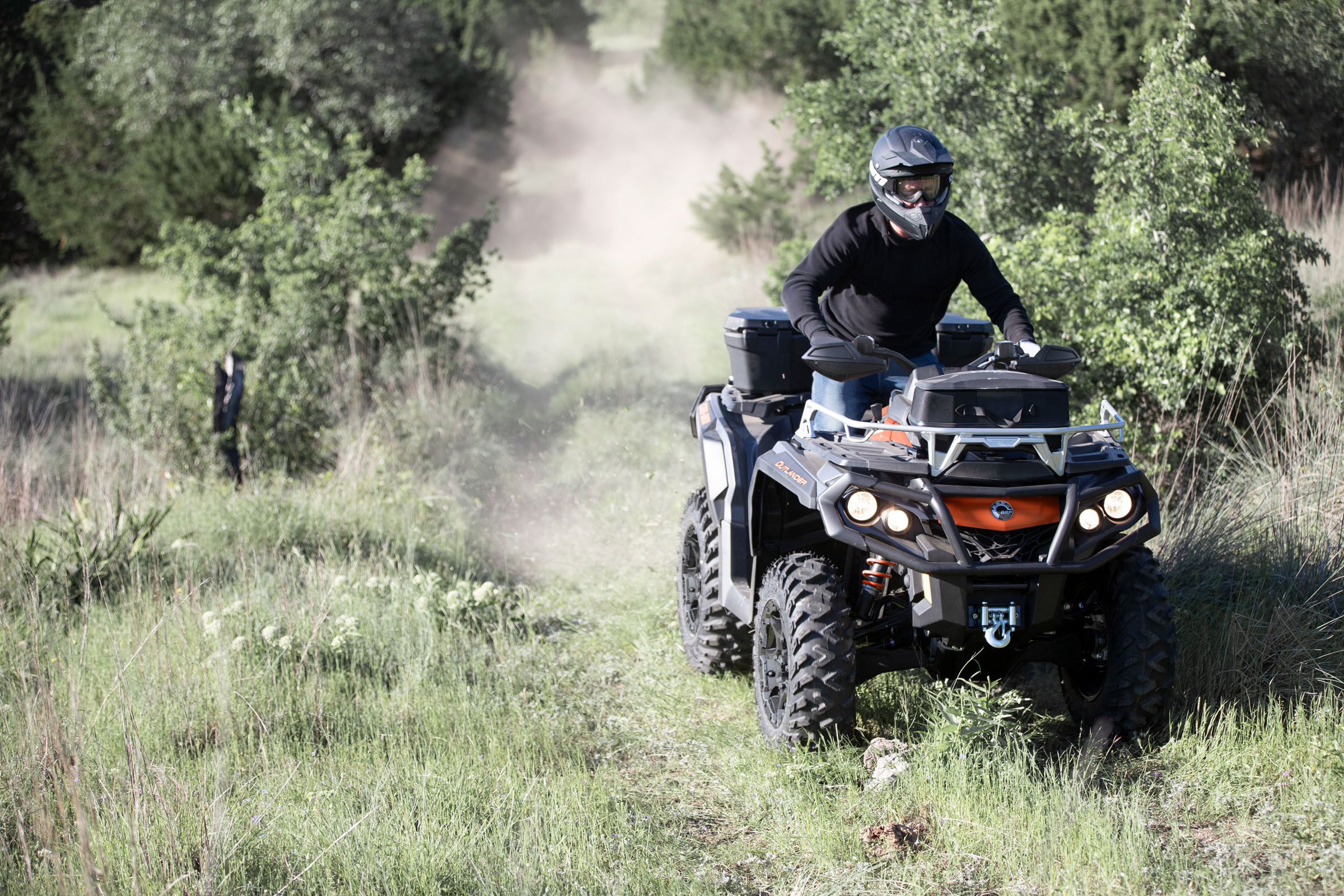 Man riding a Can-Am Outlander XT 1000R ATV