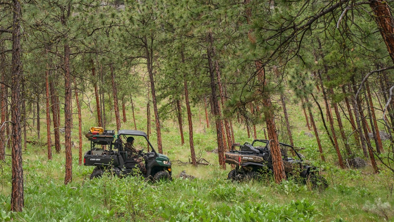 2 Can-Am Off-Road SxS riding in the woods