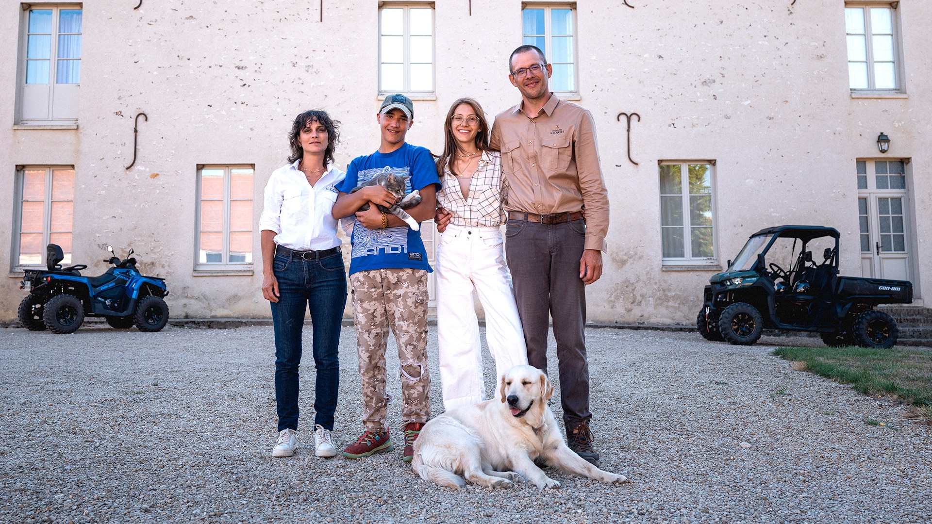 Crochet family along with a Can-Am Defender and Outlander ATV