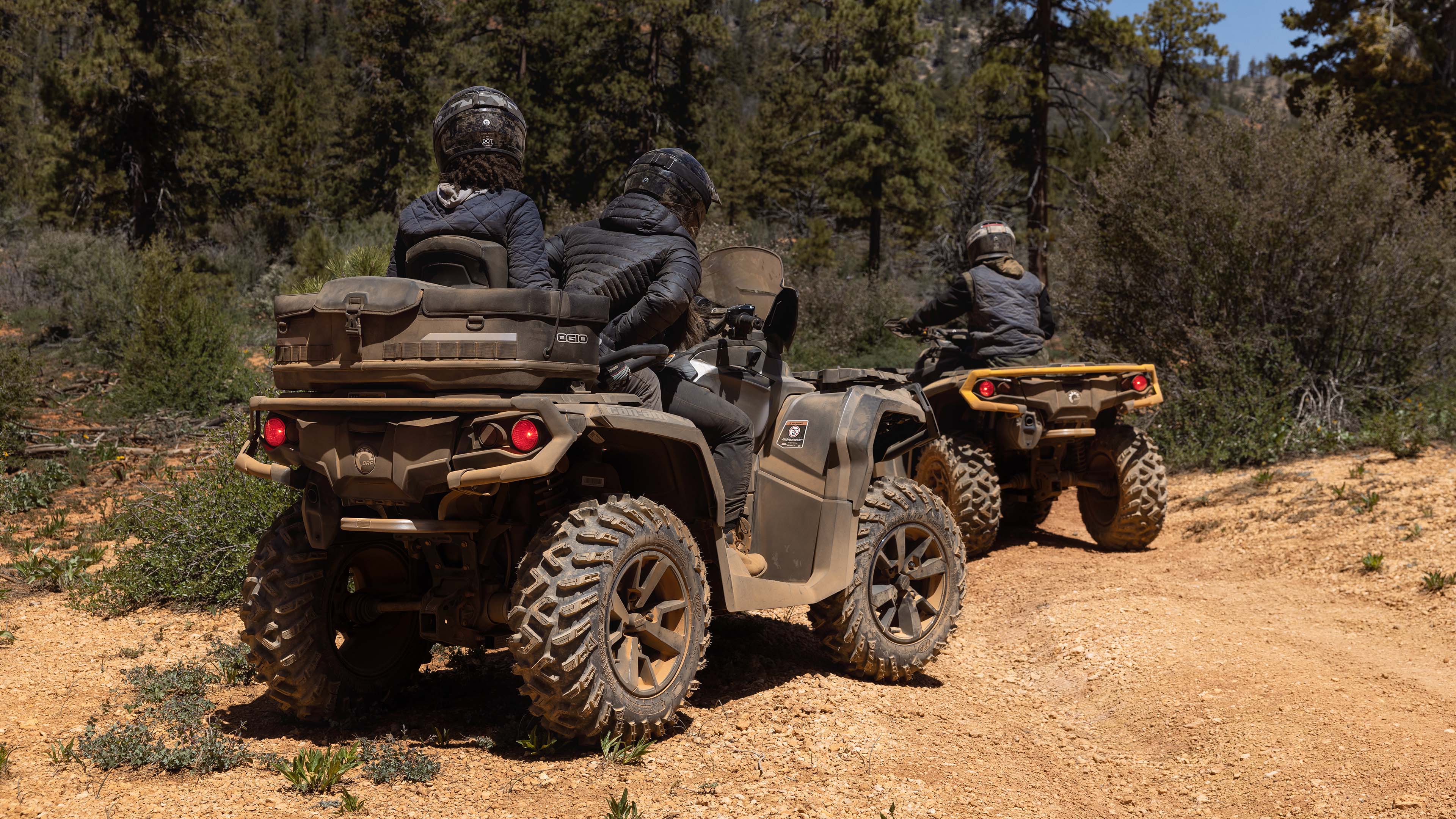 Two Can-Am Outlanders from behind