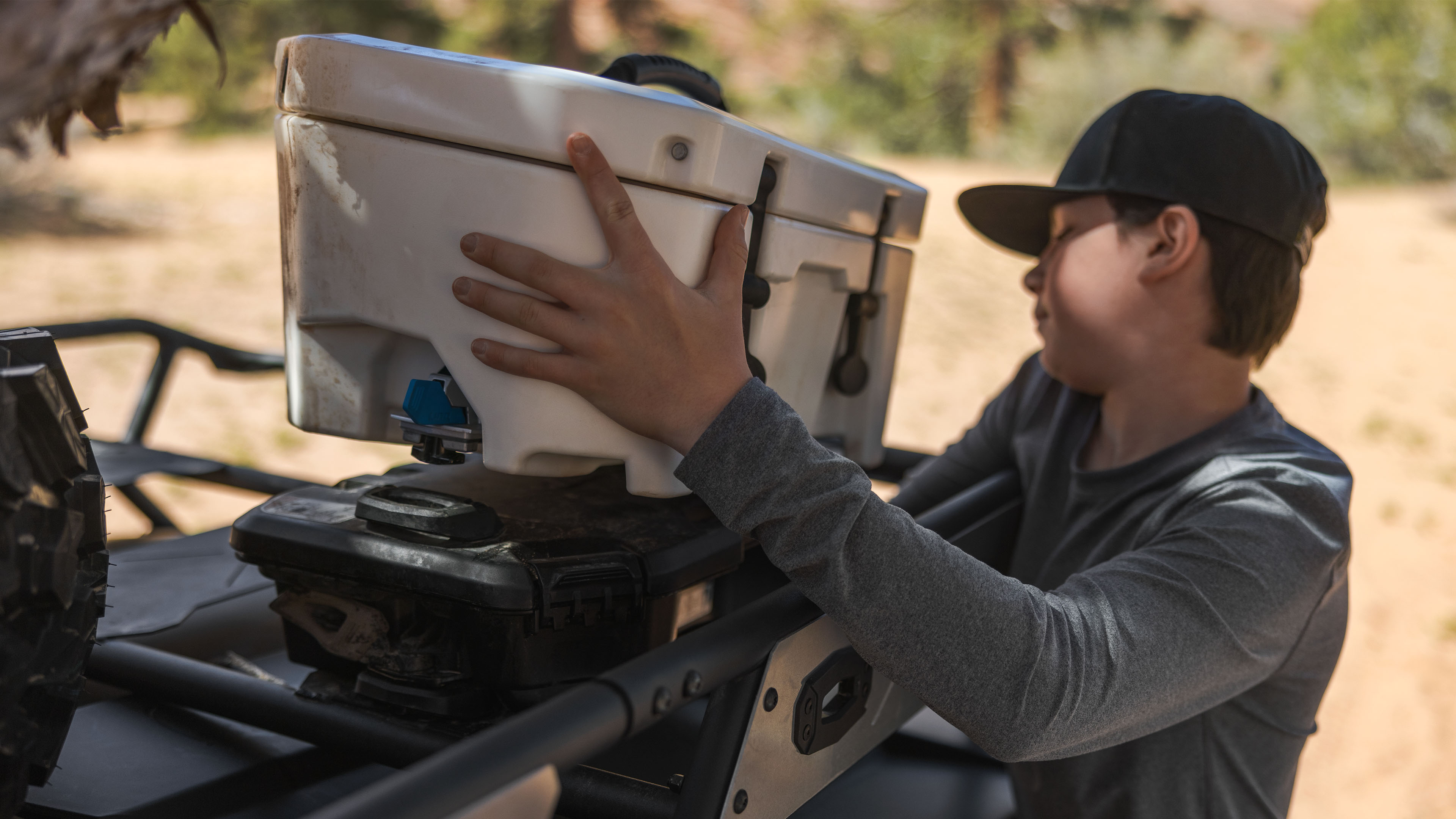 Boy installing LinQ Cooler