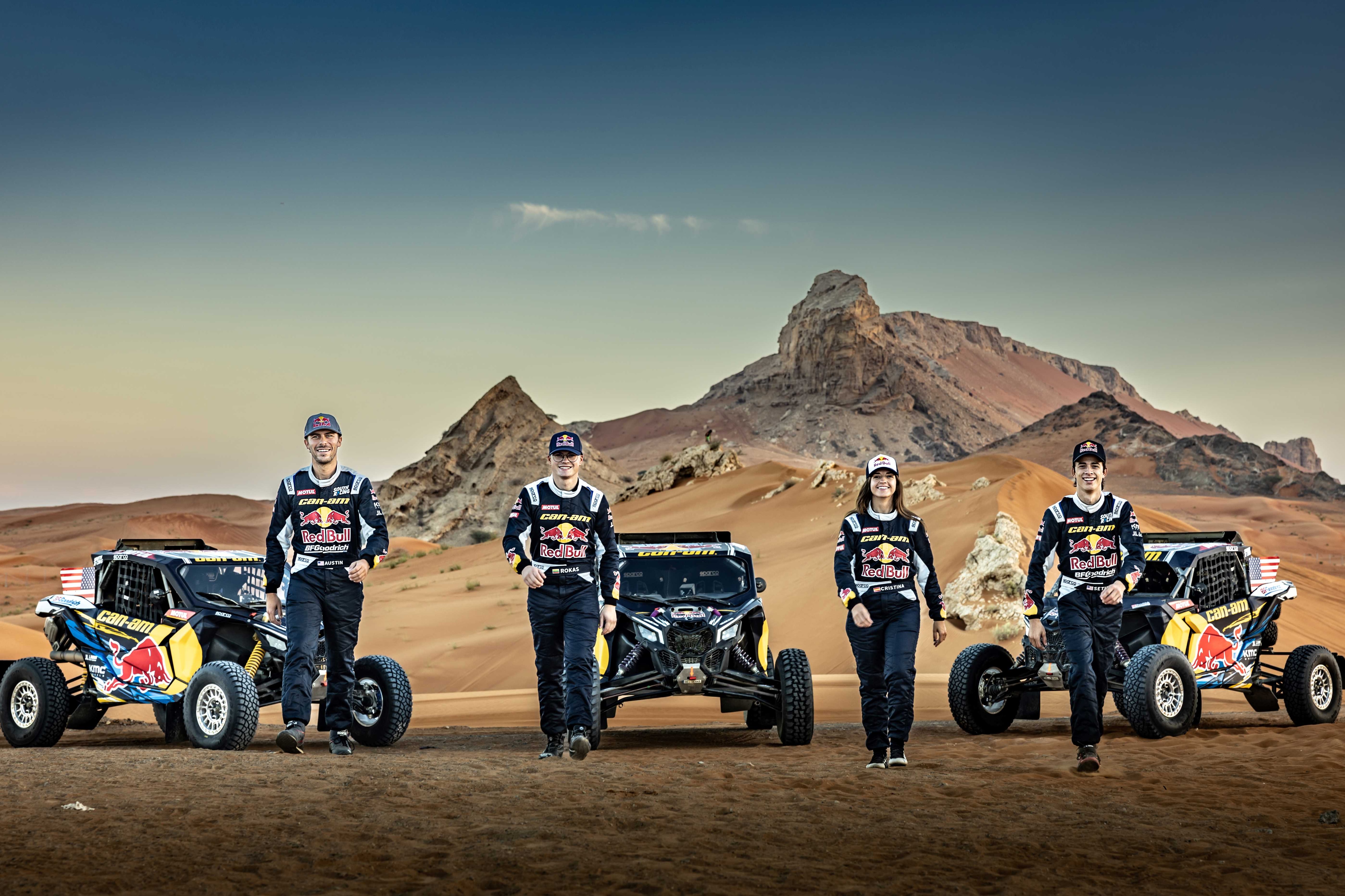 Can-Am and Red Bull teams with their vehicles