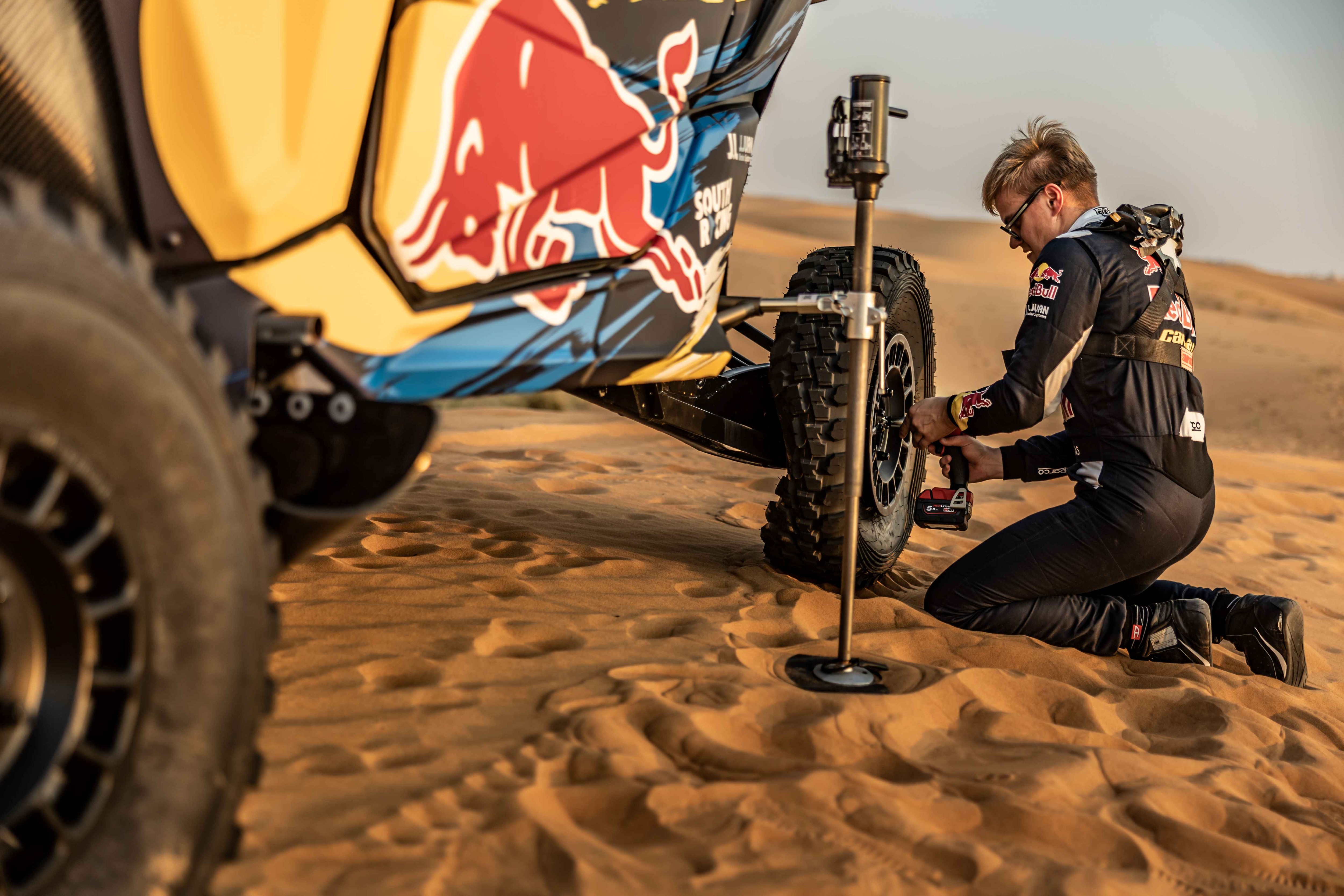 Scott changing a tire