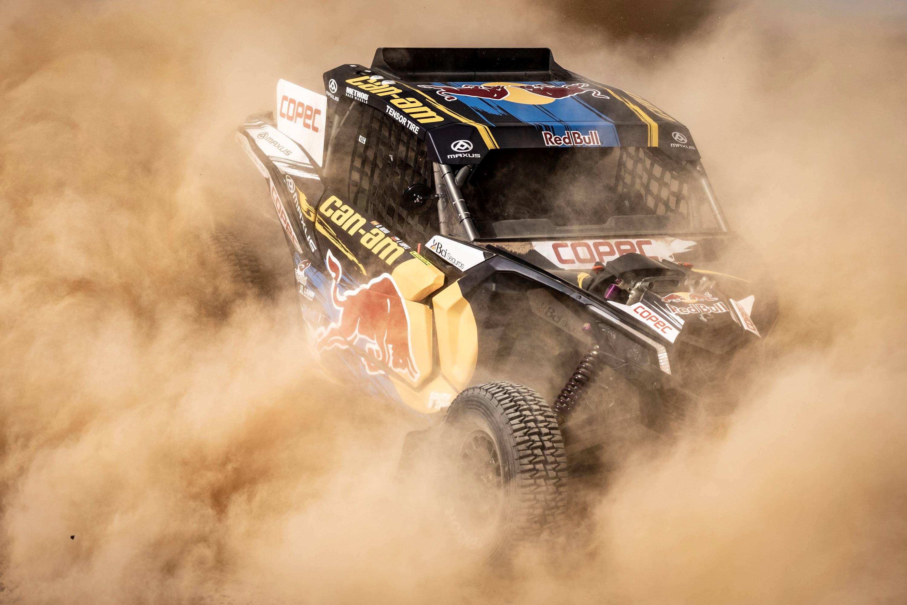 Maverick X3 in the Saudi desert surrounded by dust