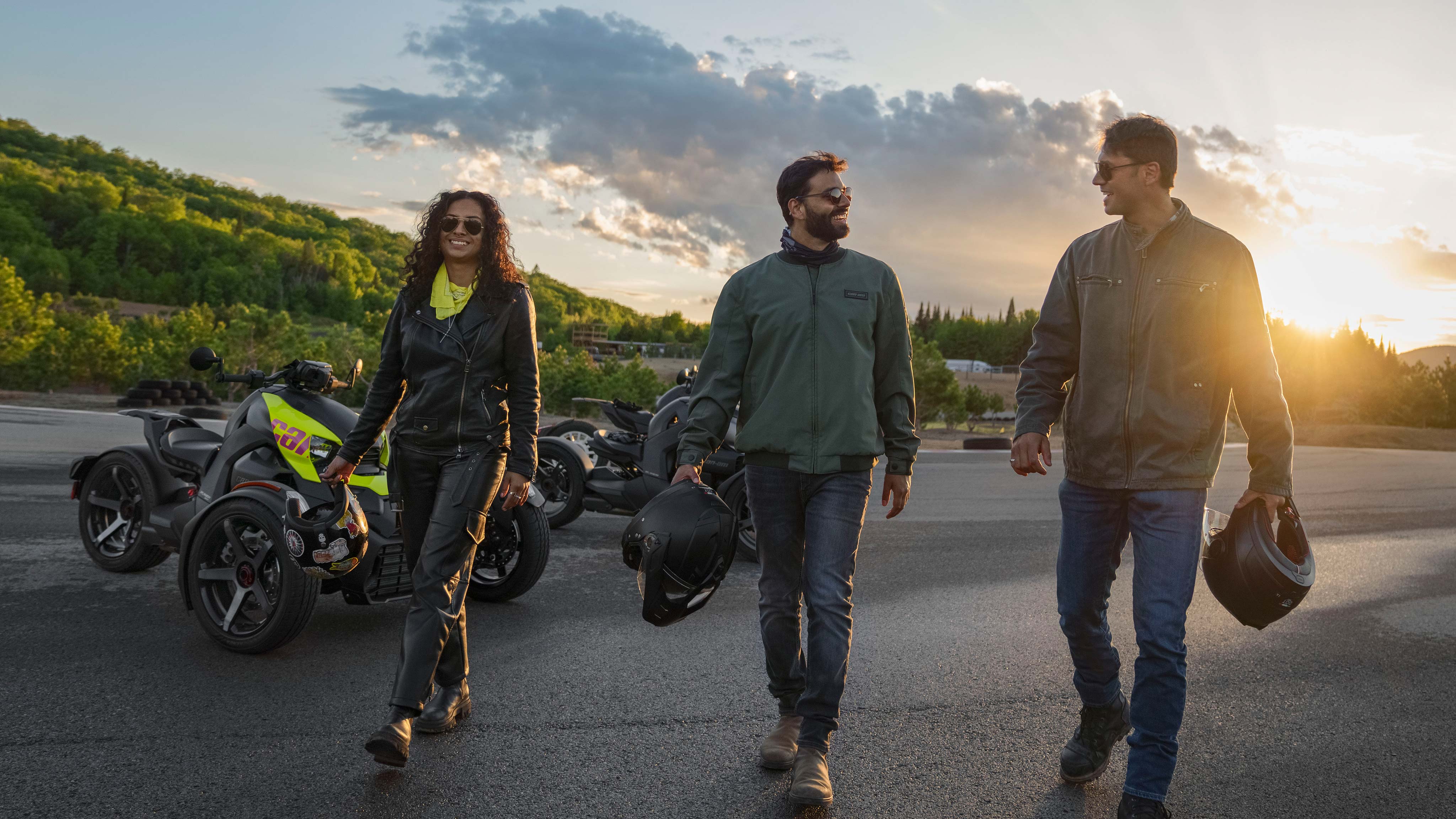 Three friends talking after a 3-wheel ride