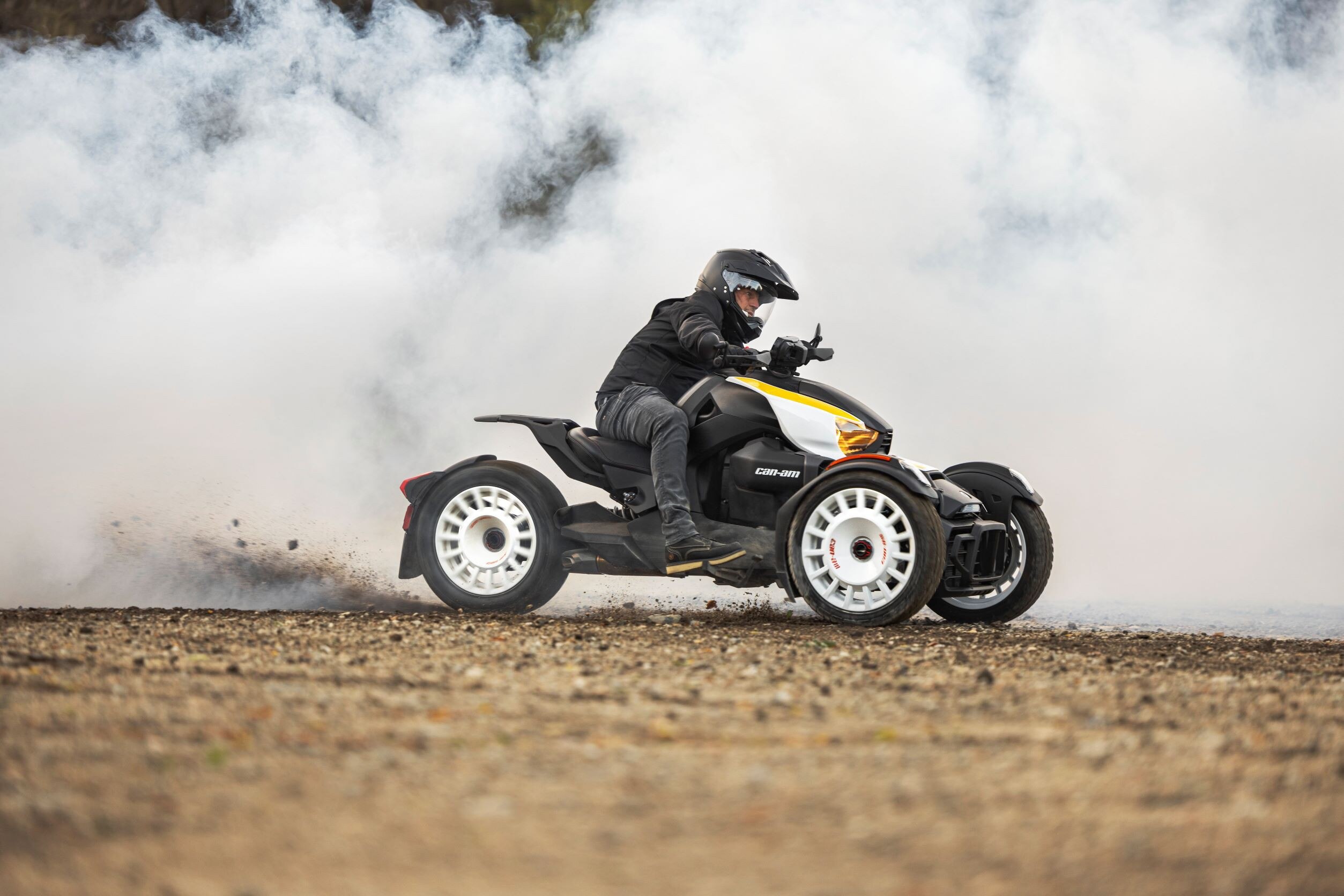 Men sliding in the gravel with his Can-Am Ryker Rally