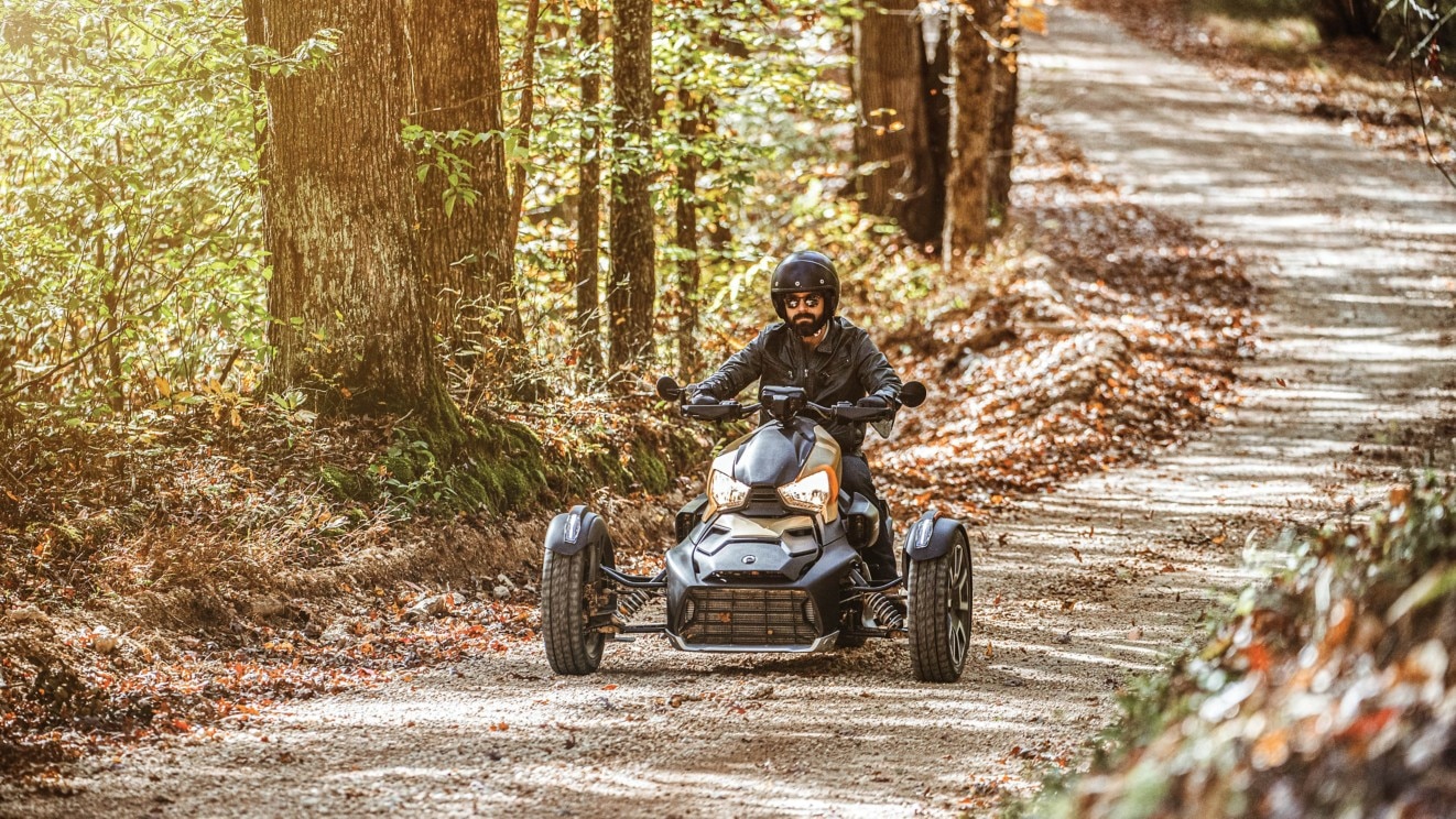 Man driving his Can-Am Ryker in the woods