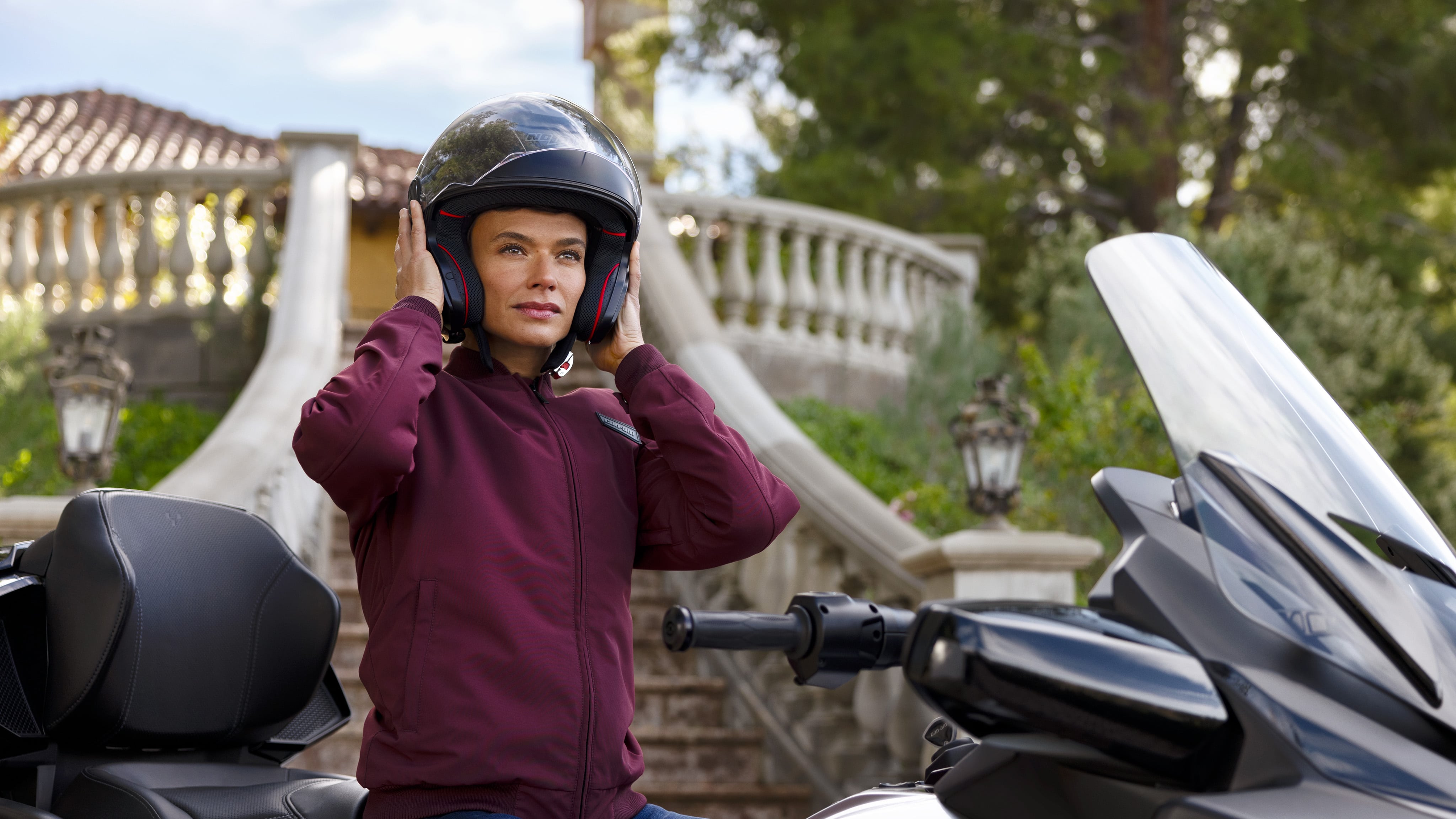 Woman wearing a 3-wheel motorcycle helmet